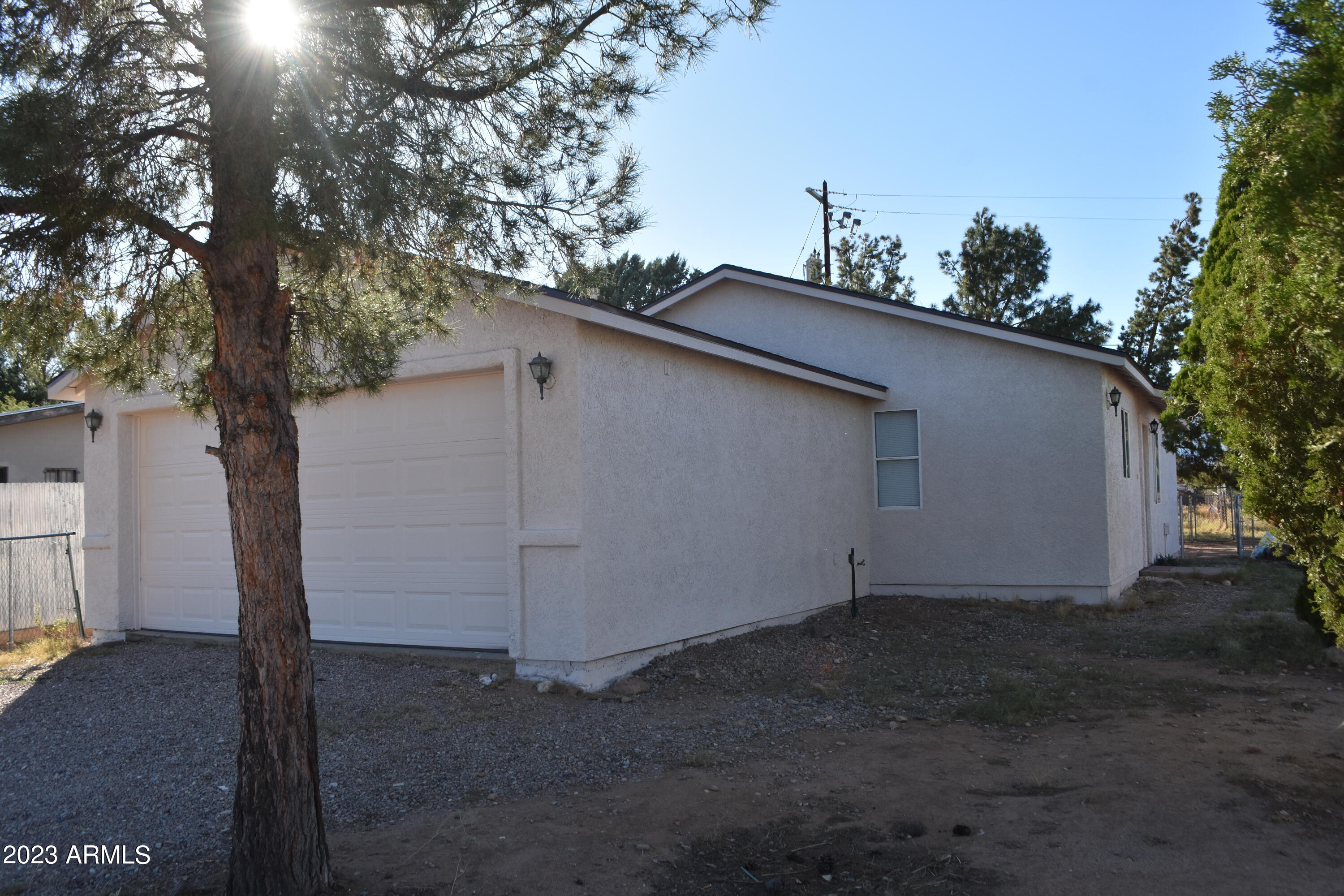 Palominas area three bedroom two bath with two car garage.  Small backyard fenced.  New paint inside and out tile floor throughout the unit.  Move in ready.