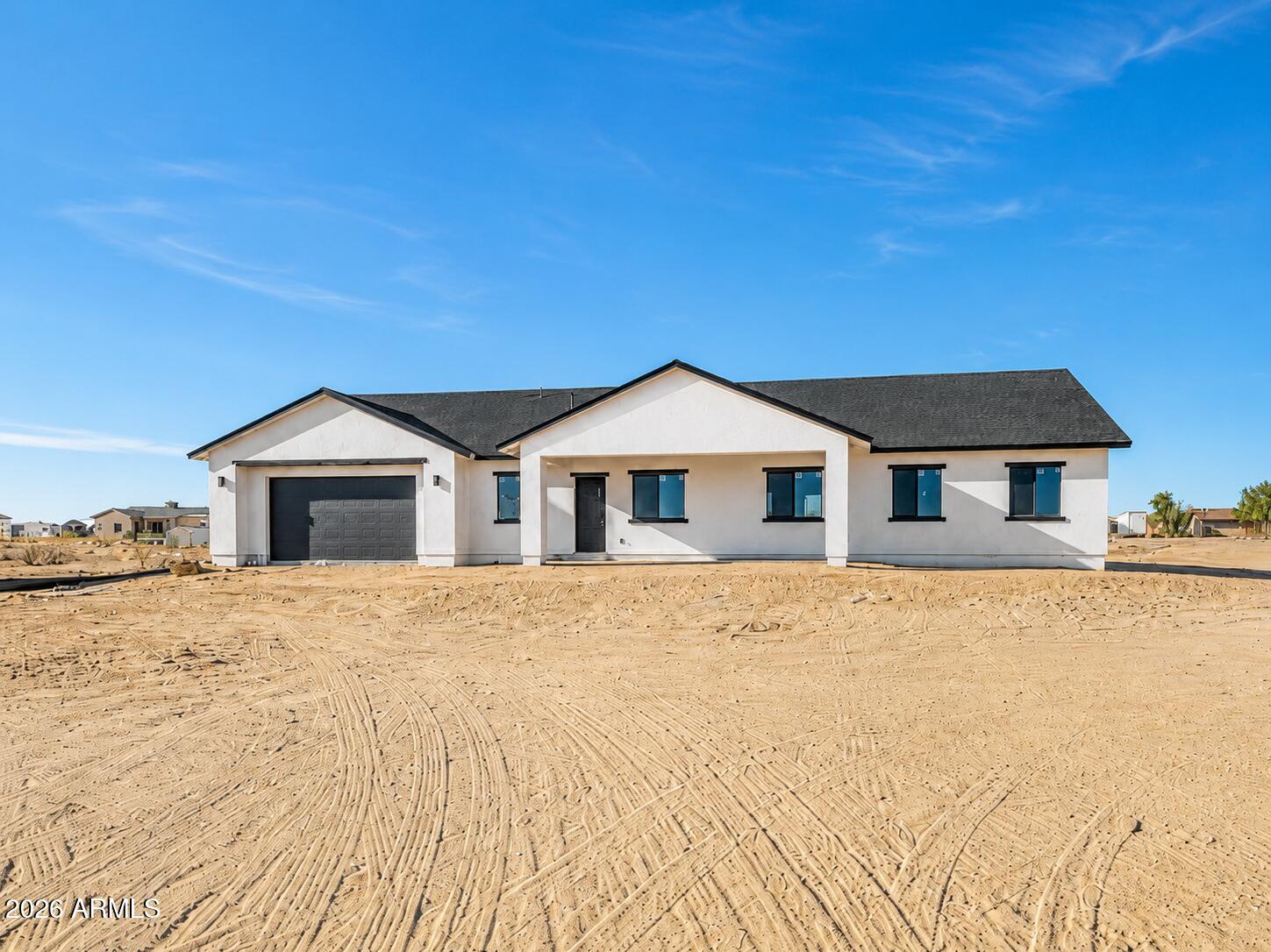Brand-new custom home on approximately 1 acre with NO HOA! This beautiful single-story home features 5 bedrooms, 2.5 bathrooms, and an open-concept floor plan filled with natural light. The spacious kitchen offers a large island, quartz countertops, and modern cabinetry, perfect for entertaining. The private primary suite includes a freestanding soaking tub, oversized tiled walk-in shower, dual sinks, and a large walk-in closet. Luxury vinyl plank flooring and stylish finishes throughout. Enjoy the covered patio and the freedom of an approximately 1-acre lot with room for RV parking, toys, gardening, or animals. Quick access to Salome Hwy.