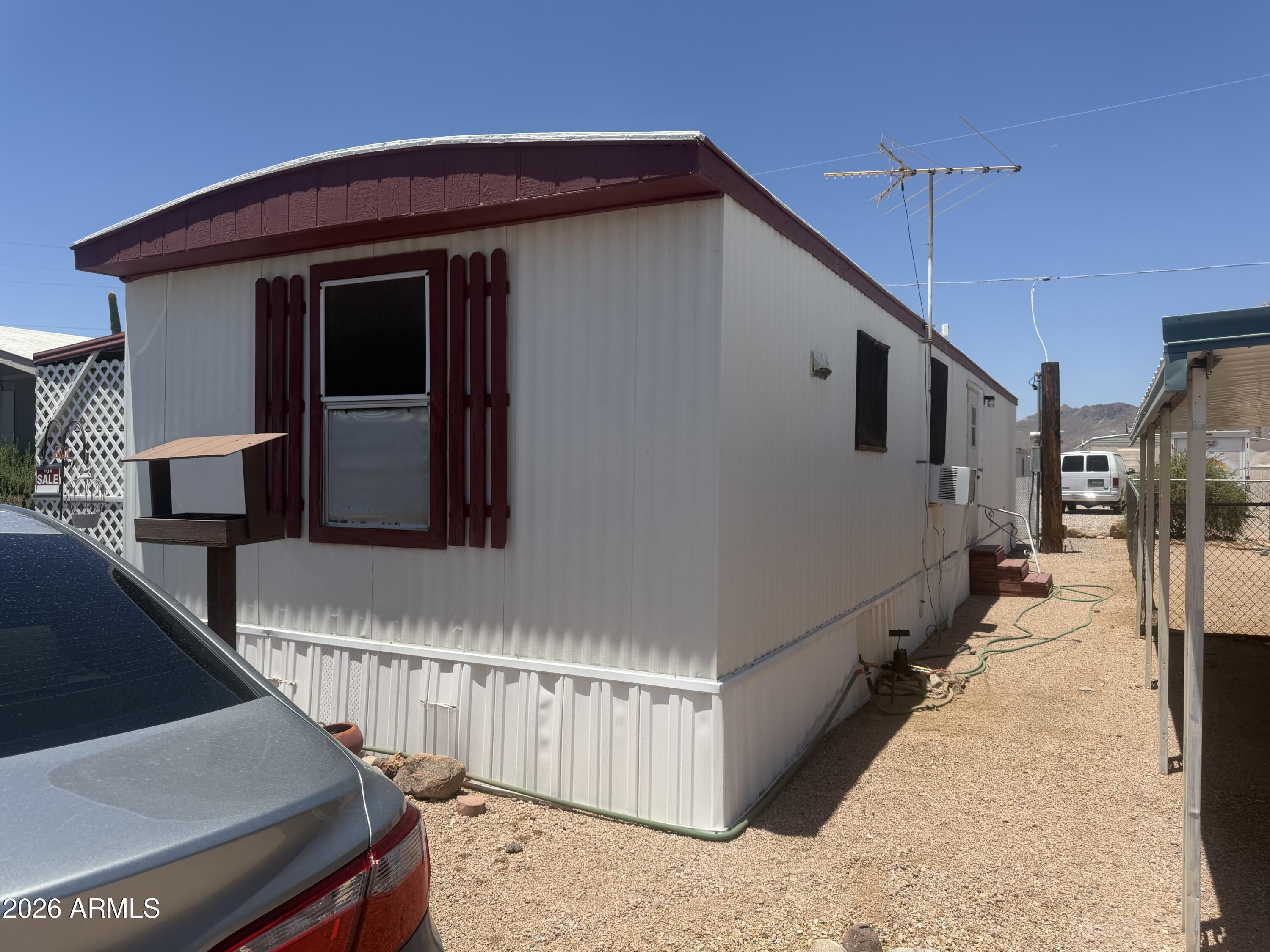Enjoy convenient living in this roomy 1-bedroom, 1-bath home featuring a versatile flex room perfect for an office, hobby space, guest area, or additional storage. Ideally located near shopping, restaurants, the Apache Junction Multigenerational Center, and a public dog park. Nestled in a quiet adult community offering a clubhouse, community dog park, and breathtaking Superstition Mountain views. Outdoor enthusiasts will appreciate the convenient access to golf courses, hiking trails, and nearby lakes. A great opportunity to enjoy an active Arizona lifestyle in a peaceful setting.