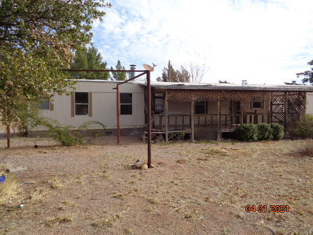 Here is a nice lot for your new mfg or site built home. It is fenced with natural gas, water company and electric to the property. Paved road too! ''Due to condition, the property may have health/safety risk(s). Prior to entry / access, all parties must sign a Hold Harmless Agreement and the property may only be shown by appointment''