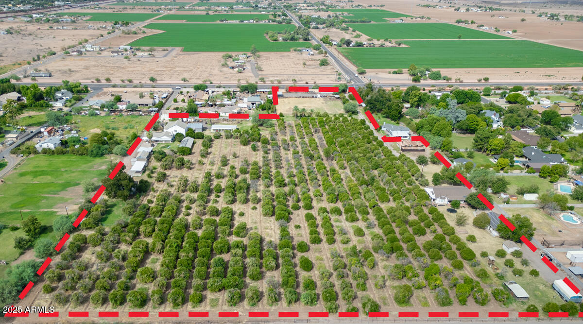 Rare 13-Acre Development Opportunity in the Lehi District of Mesa, AZ
3131 N Gilbert Rd, Mesa, AZ 85203

Discover a unique opportunity to develop 13 acres of prime land in the heart of Mesa's historic Lehi District. Currently an orange orchard, the property is ready for transformation into one-acre parcels—ideal for custom homes.

Perfectly situated just off Gilbert Road and the Red Mountain Freeway (AZ-202), this location offers the charm of rural living with unmatched access to urban amenities. Nestled along the scenic Salt River, the land reflects Arizona's rich pioneer heritage while being just minutes from Mesa's vibrant dining, shopping, and top-rated schools. Rare 13-Acre Development Opportunity in the Lehi District of Mesa, AZ
3131 N Gilbert Rd, Mesa, AZ 85203

Discover a unique opportunity to develop 13 acres of prime land in the heart of Mesa's historic Lehi District. Currently an orange orchard, the property is ready for transformation into one-acre parcelsideal for custom homes.

Perfectly situated just off Gilbert Road and the Red Mountain Freeway (AZ-202), this location offers the charm of rural living with unmatched access to urban amenities. Nestled along the scenic Salt River, the land reflects Arizona's rich pioneer heritage while being just minutes from Mesa's vibrant dining, shopping, and top-rated schools.

The property includes multiple existing structures, Large House, 2 modular homes, mechanics garage, storage buildings and carports presenting an excellent opportunity for developers, investors, or families seeking a blend of serenity and connectivity in the thriving Phoenix metro area.