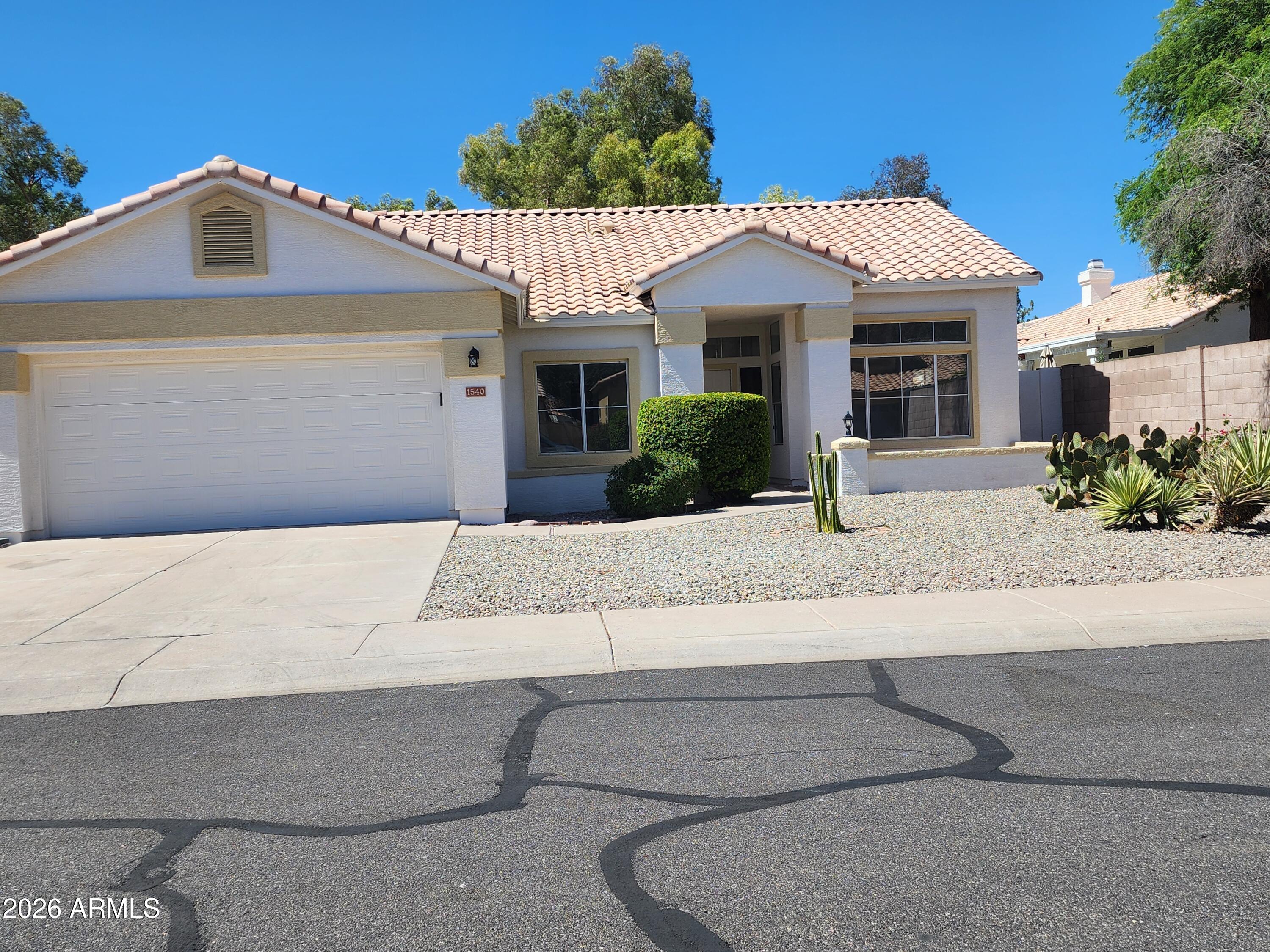 Welcome to this beautiful 3-bedroom, 2-bath home in the heart of Gilbert! Featuring an open-concept floor plan, this home offers a spacious living area, a well-appointed kitchen with ample cabinet space, and a private primary suite with an en-suite bath and walk-in closet. The additional bedrooms provide flexibility for family, guests, or a home office. Enjoy a low-maintenance backyard perfect for relaxing or entertaining, plus a two-car garage and convenient indoor laundry. Located near top-rated schools, parks, shopping, dining, and easy freeway access, this home combines comfort, convenience, and the best of Gilbert living.