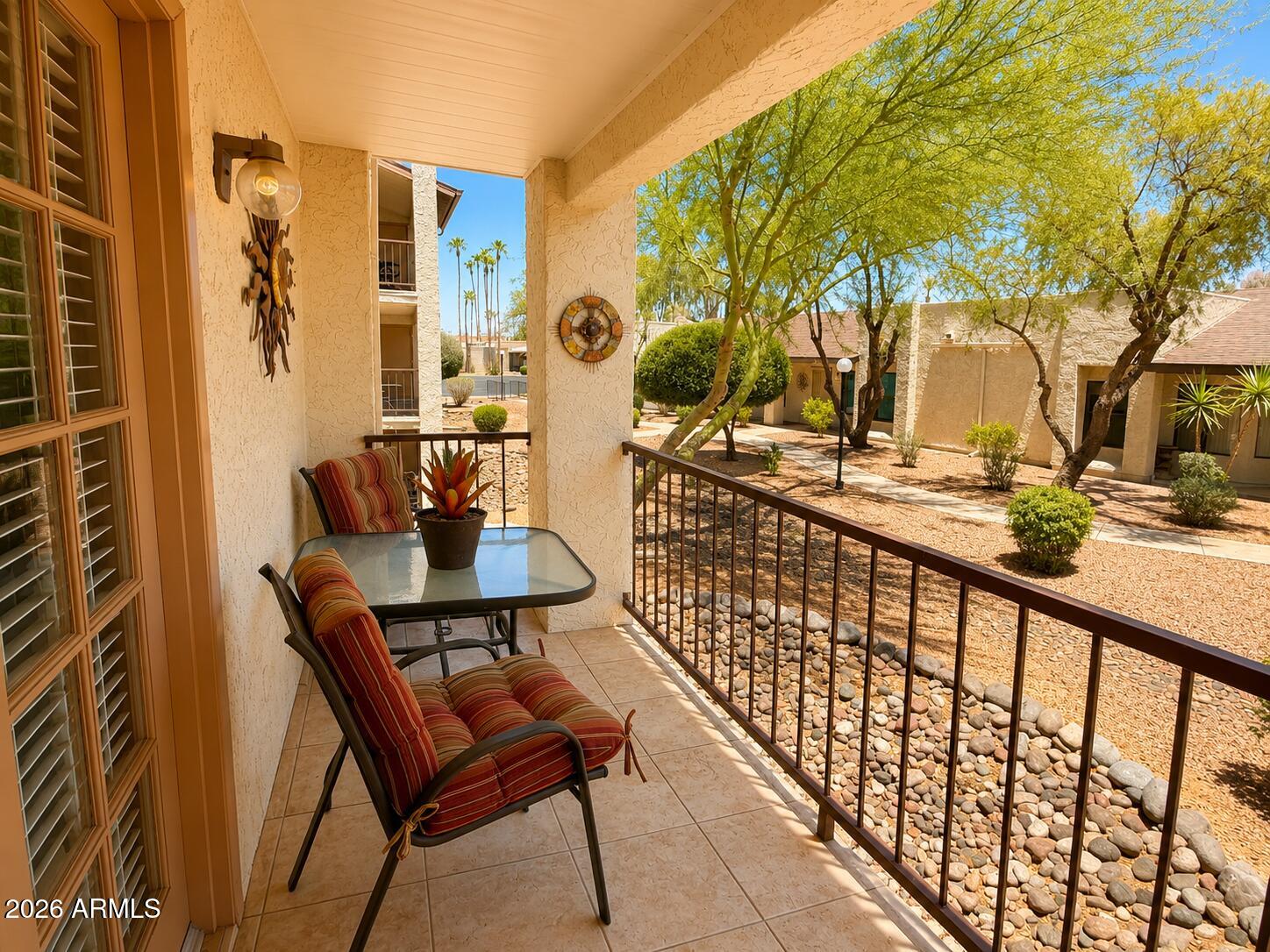 Move-in ready and fully furnished, this beautifully maintained 2-bedroom, 2-bath condo is located in the highly desirable 55+ Village at Apache Wells community. Whether you're looking for a full-time residence or the perfect seasonal retreat, this home offers comfort, convenience, and exceptional value. Tasteful updates, an inviting floor plan, and a spacious primary suite with an updated vanity make it easy to feel right at home. The HVAC system was replaced in 2015 and has been gently used.

All furnishings, décor, kitchenware, and household items currently in the home convey, making this a truly turnkey opportunity. If the buyer prefers an unfurnished home, the seller is willing to remove the furnishings prior to closing.

Enjoy low-maintenance living with an HOA that covers nearly everything except electricity and phone. Residents also enjoy outstanding amenities, including a clubhouse, fitness center, pool, heated spa, community laundry, and an active social calendar. Conveniently located near shopping, restaurants, golf, medical facilities, Loop 202, and Saguaro Lake, this is Arizona active adult living at its finest.