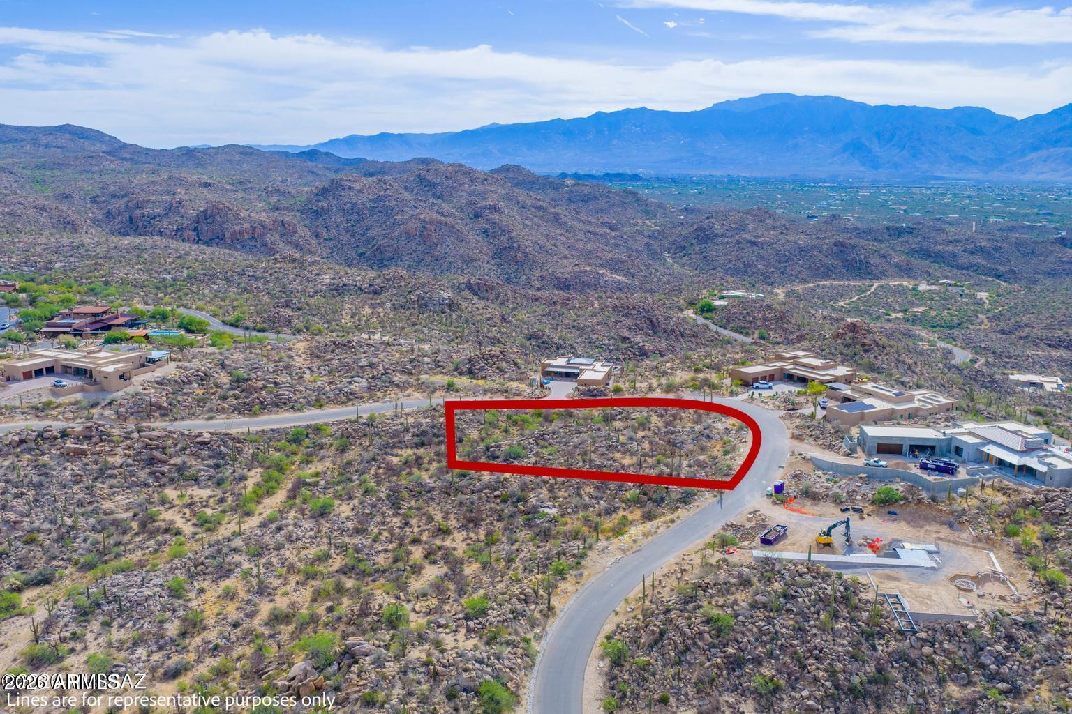 Experience elevated desert living on Homesite 38 at Saguaro Ranch, one of North Tucson's most exclusive luxury communities ideally positioned between Dove Mountain and Stone Canyon. Spanning approximately 1.32 acres, this premium homesite is ready for you to build your custom luxury retreat surrounded by breathtaking mountain views, dramatic saguaros, and stunning Sonoran Desert landscapes. Enjoy paved roads, underground
utilities, and access to the future Owners Club lifestyle experience. Located just minutes from world-class golf, hiking, dining, and the The Ritz-Carlton, Dove Mountain. A rare opportunity to create your dream home in one of Tucson's most sought-after luxury developments.