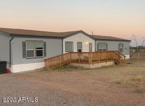 Looking to live in the country but would like to stay close to town, then you have to come check out this gorgeous 4 bedroom home just on the out skirts of town. This beautiful home sits on one full acre fulling fenced. With RV parking and gate, with full RV hook ups with a 50 amp box. This property also has a 250 sqft guest house with a bathroom and kitchenet. Property has was built in 2016 and has all new appliances, gas furnace and stove, electric water heater, and a new septic.