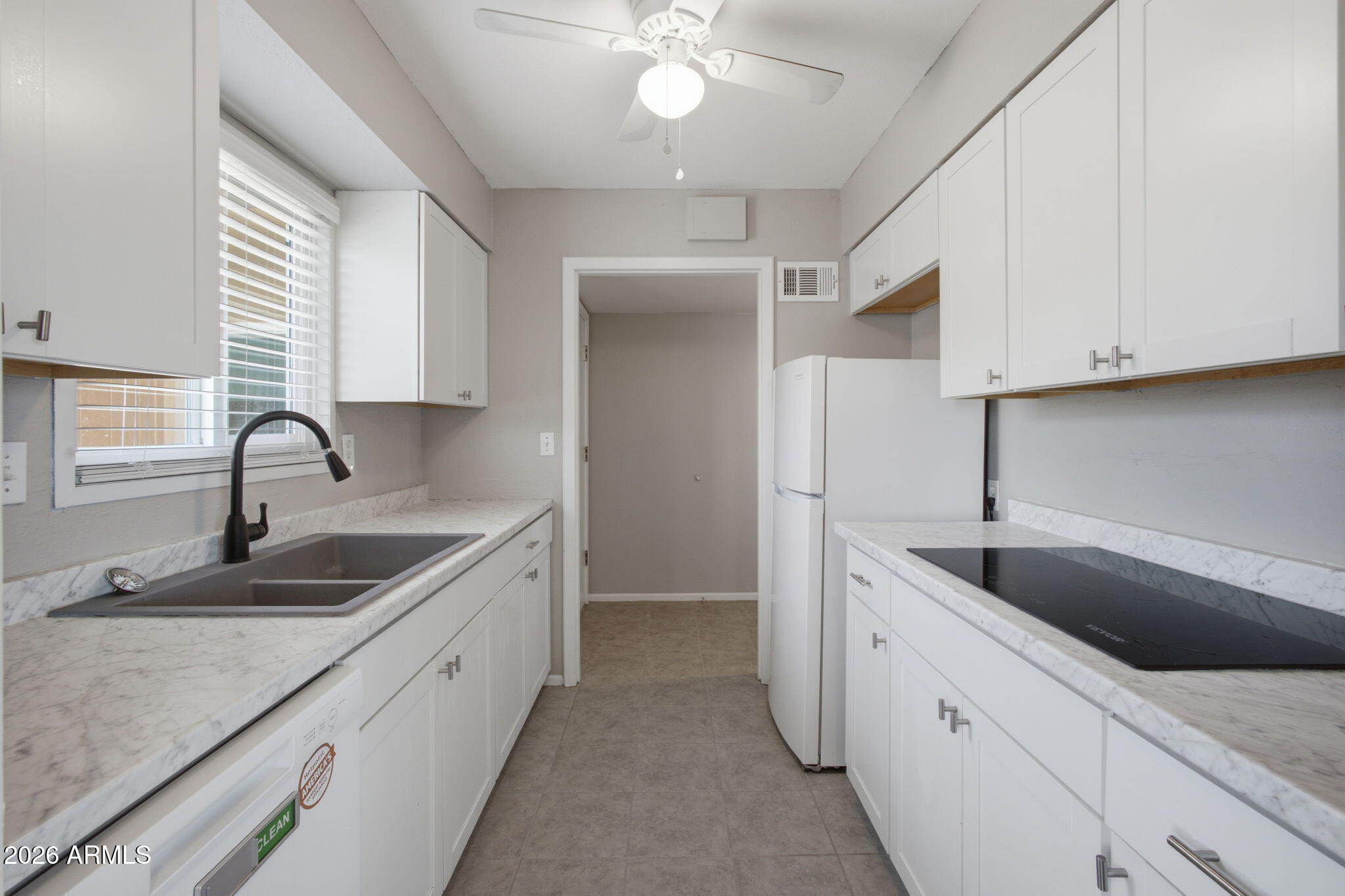 Come enjoy this freshly renovated 1-bedroom, 1-bath unit in Sun City. This move-in-ready home features brand-new tile flooring, freshly painted walls, new kitchen cabinetry, a new sink with updated fixtures, and a new electric cooktop. Thoughtfully updated throughout, this charming unit offers a clean, modern feel in a desirable Sun City location. Don't miss this opportunity to own a beautifully refreshed home.