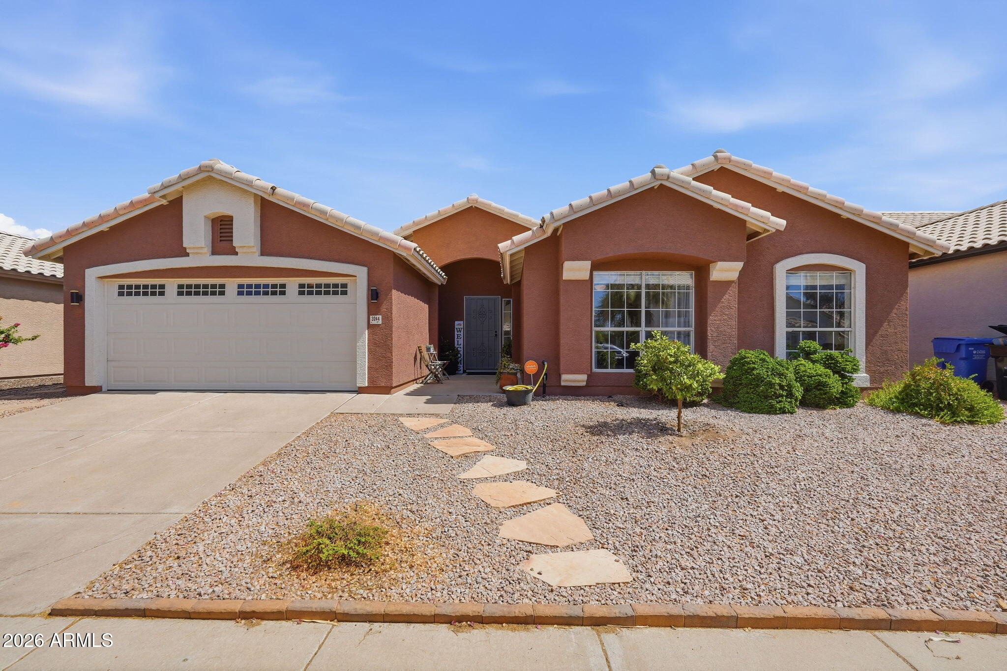 Beautifully maintained inviting home that combines timeless style w/ comfortable everyday living in a quaint, family-friendly neighborhood. Beautiful LVP flooring flows throughout, complemented by soaring vaulted ceilings & abundant natural light. Enjoy multiple living spaces including a welcoming living room, cozy family room, & formal dining w/ pass-through to the kitchen. The kitchen features stainless appliances, ample cabinetry & counter space. The primary retreat offers vaulted ceilings, walk-in closet & ensuite w/ dual sink vanity, soaking tub & walk-in shower. Three additional well appointed bedrooms & hall bath. Dream backyard w/ sparkling pool, lush grass, firepit, covered patio & an incredible mature shade tree creating a beautiful park-like setting that is enjoyable year round.