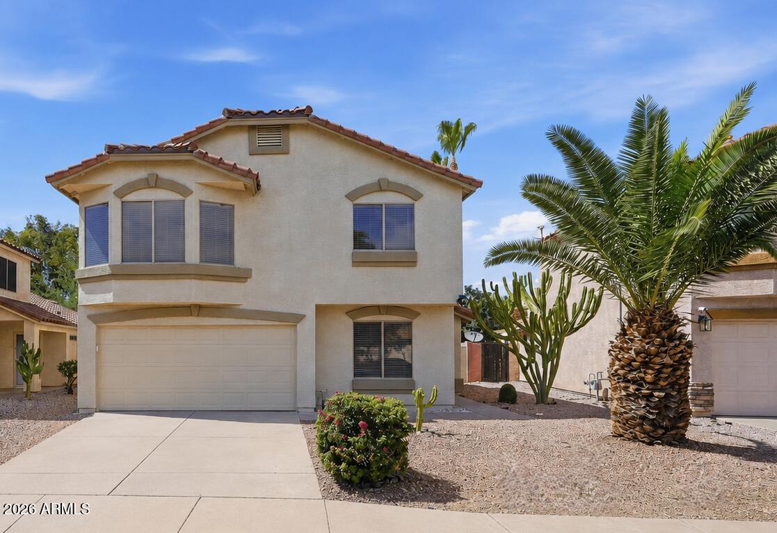 Welcome to this beautifully updated home in the desirable Arroyo Rojo community, offering modern finishes, spacious living areas, and a fantastic backyard perfect for entertaining. This 3-bedroom, 2.5-bathroom home features a bright and open floor plan with stylish upgrades throughout and a layout designed for comfortable everyday living. Inside, you'll find updated flooring, fresh contemporary finishes, abundant natural light, and inviting living spaces that flow seamlessly from room to room. The kitchen offers ample cabinetry, generous counter space, and updated appliances, opening to the dining and living areas for easy entertaining. Upstairs, the spacious primary suite provides a relaxing retreat complete with an ensuite bathroom, while the additional bedrooms offer flexibility for guests, family, or a home office setup. Thoughtful updates throughout the home create a clean, move-in-ready feel. Step outside to enjoy the oversized backyard with plenty of room for outdoor dining, entertaining, pets, or play. Situated on a premium lot in a well-maintained North Phoenix neighborhood, this home is conveniently located near parks, shopping, dining, schools, and easy freeway access.