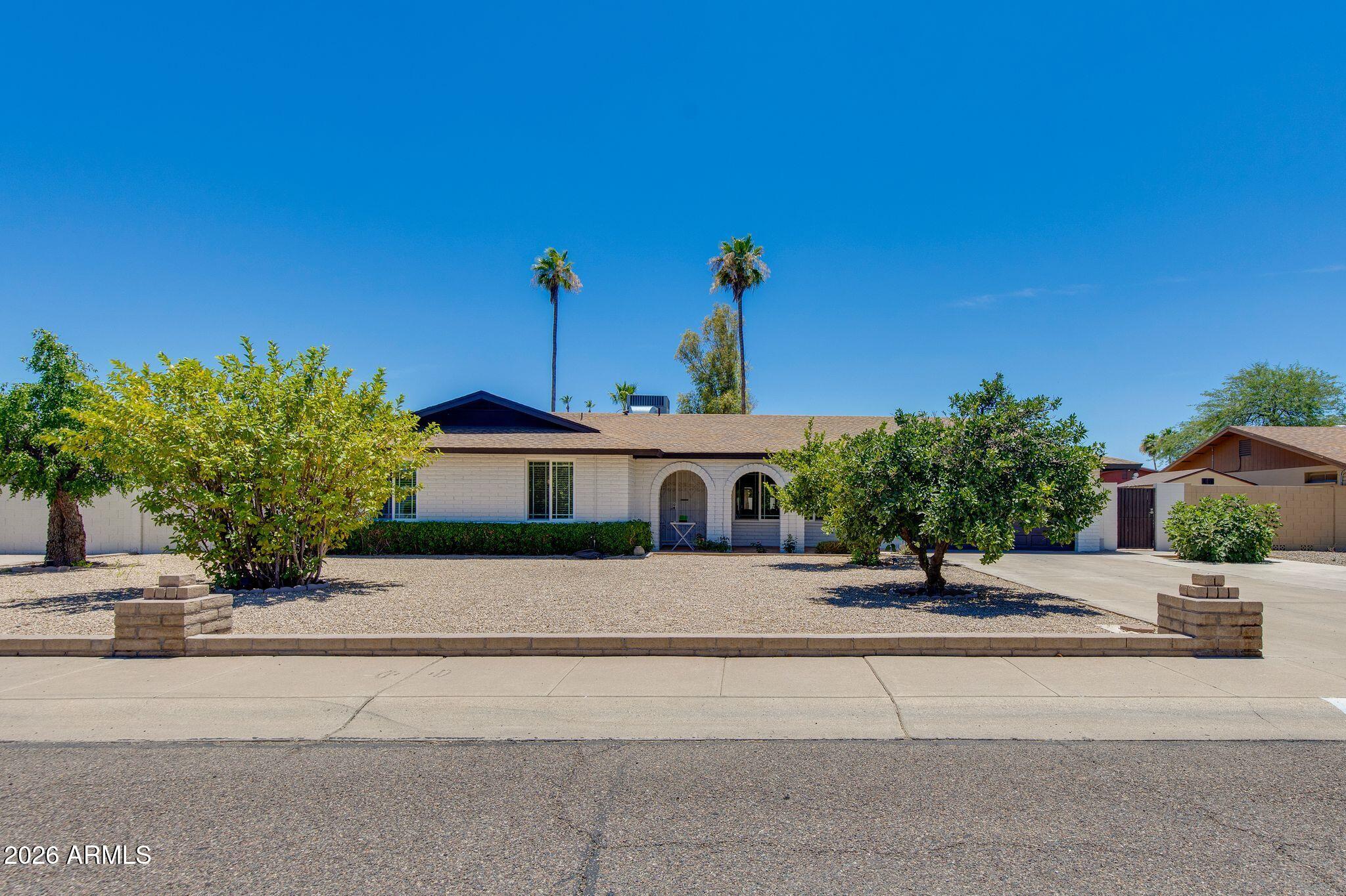 Located in one of Phoenix's most popular neighborhoods in the valley! just under ¼ acre (10,175 sq ft).& no HOA! Features a beautifully maintained 4/2 bath home in the highly sought after Sheaborhood!  85028 w Stunning Mountain Views! Inside offers Abundant Natural light thru-out, large newer widows & doors w plantation shutters adding warmth & charm. The spacious Living room flows into the kitchen featuring granite countertops & beautiful wood cabinetry. Single-level with no steps! Large Master Bathroom w walk in closet, a Separate door access to covered Patio. Step outside to your own backyard retreat featuring a sparkling pebble finish Diving pool, mature fruit trees, orange, lemon & fig, garden space and plenty of room to relax & enjoy Arizona living. Major updates provide peace of mind including a new roof in 2018, A/C in 2021,& a new pool pump in 2025 . Featuring  a New Custom spa like bath in 2025. Don't miss this opportunity to make yours! Upgrades include newer windows, sliding door w Built in blinds leads to the private backyard w a covered patio from both F/R & primary Bdrm.  The N/S facing lot also offers a 2 car garage, extra slab parking, an a quiet street location.
In addition to nearby Shopping & dining, & a PV School district, your just minutes away from AZ 51, hiking trails, biking, golf course & re-imagined New PV mall, Lifetime fitness & Costco & 15 min from sky harbor airport. This pride of ownership property offers both convenience & opportunity! This is the up & coming neighborhood where values continue to increase as it borders Paradise Valley & the New revamped PV Mall just a few miles away! Prime location, come take a look!