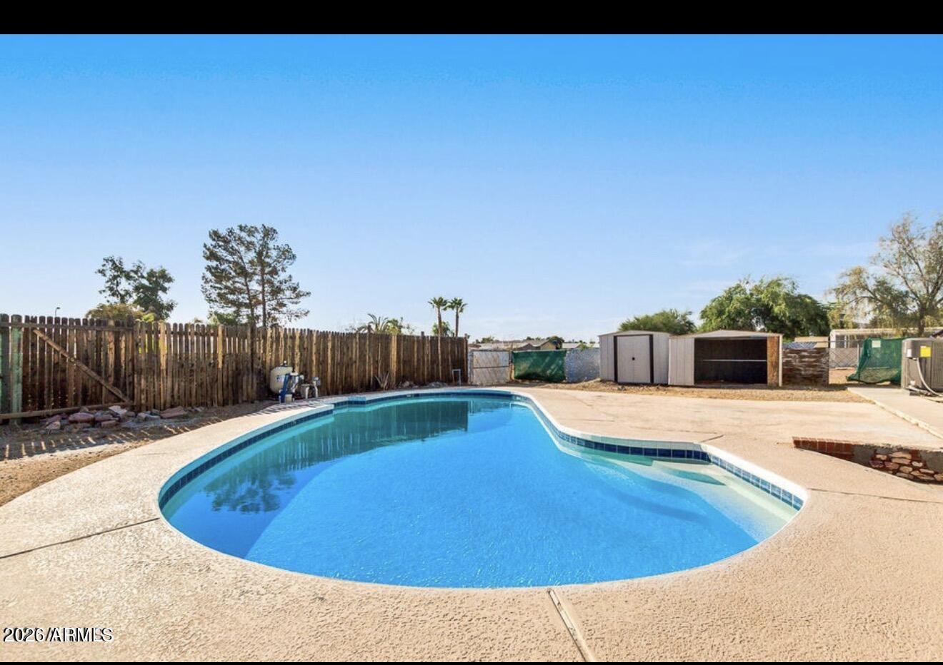 Enjoy stunning desert living with a private in-ground pool, no HOA, and breathtaking Superstition Mountain views in this Apache Junction home! Featuring a bright, open layout filled with natural light, this beautifully updated residence offers a welcoming living space perfect for everyday comfort. The kitchen shines with modern finishes and ample cabinetry, while spacious bedrooms provide a relaxing retreat. Step outside to your private in-ground pool and generous yard--ideal for entertaining, unwinding, and enjoying unforgettable Arizona sunsets. Conveniently located near hiking trails, parks, shopping, dining, and easy Valley access. A rare blend of scenery, style, and lifestyle--don't miss this one!