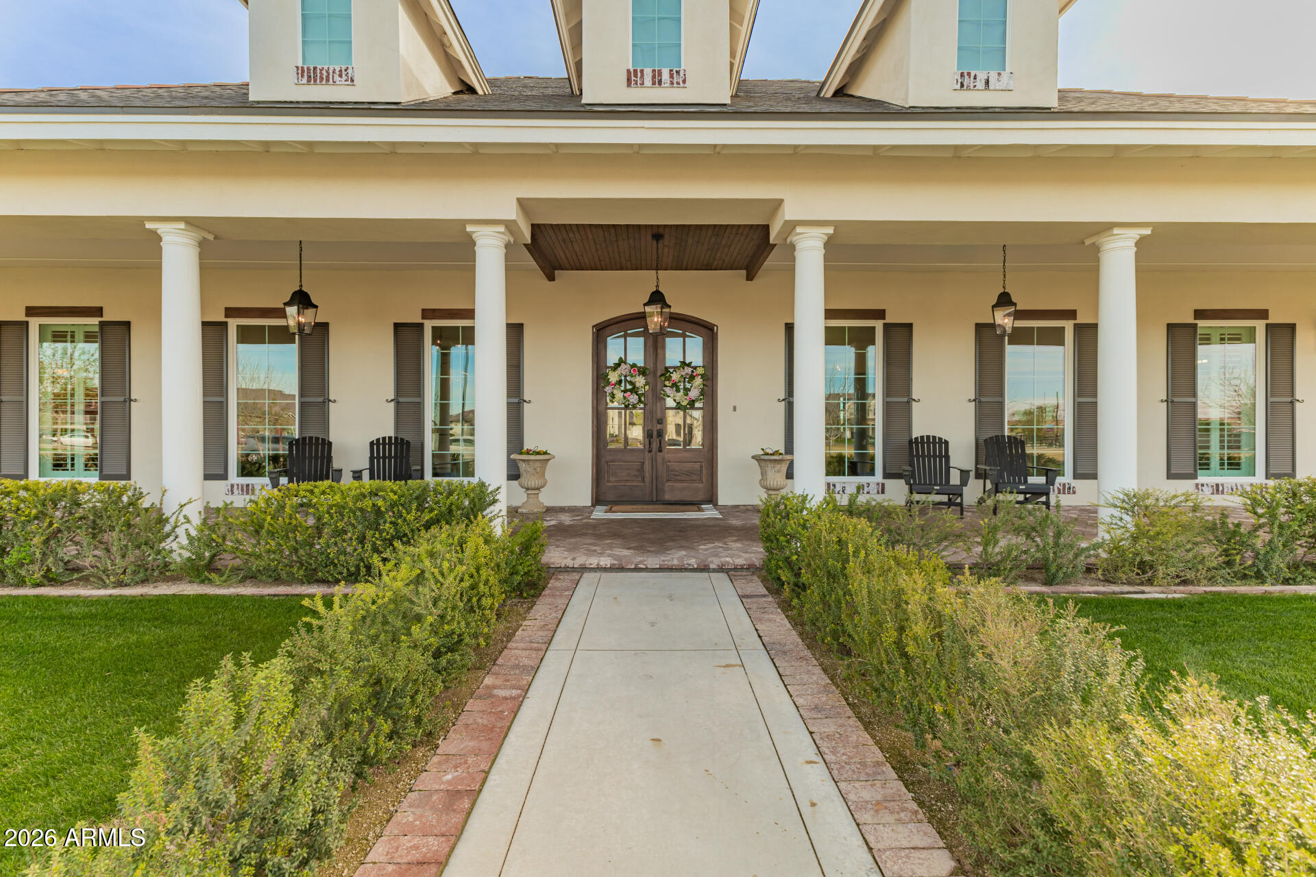 PRICED BELOW APPRAISAL!
Opportunities like this rarely come along.
Welcome to Haven Groves - a true unicorn in Gilbert. An exclusive gated enclave of just seven custom homes centered around a beautiful three-acre community park with lush grass, a playground, firepit and sports court. It's the kind of neighborhood where kids play outside, neighbors gather, and life feels a little slower.

Located in South Gilbert, the home is just minutes from SanTan Village, Discovery Park, multiple hospitals, gyms, shopping, dining, and top-rated schools, offering both convenience and lifestyle in one of the East Valley's most desirable areas.

Set on a full one-acre lot with horse privileges, the home offers 5,623 square feet with 6 bedrooms, 5 full baths, and 2 half baths. A six-car garage includi massive attached fully insulated RV garage, along with a circular drive, provides exceptional space for vehicles, toys, and projects. Inside, natural light fills the home and highlights crown molding, coffered details, and warm, inviting living spaces centered around a beautiful fireplace. The kitchen sits at the heart of the home and features an imported Hallman double gas oven, pot filler, custom hood, quartz countertops, walk in pantry and generous space for cooking and gathering. Bulter's pantry with appliance station and walk through to dining room.

The layout includes a private den for work or creative space, along with guest quarters featuring its own living area and full kitchen, ideal for extended family or long-term guests.

The backyard was designed for gathering, with three sets of French doors opening to a covered patio, outdoor fireplace, sparkling pool, hot tub, and multiple seating areas. A built-in BBQ, smoker, pizza oven, outdoor pool bathroom, and outdoor shower make entertaining effortless.

The grounds are equally special, featuring an orchard with over two dozen varieties of fruit trees including blood orange, lemon, lime, grapefruit, apple, pomegranate, plum, apricot, pear, grapes, and blackberries, along with a rose garden and peaceful meditation garden.

Upgrades include two tankless water heaters, new HVAC systems in 2024, upgraded insulation, and a finished attic storage space with pull-down staircase access from the pantry.

With horse privileges, a storage/playhouse, and room to expand, build, or simply enjoy the space, this property offers the kind of land and lifestyle that's becoming harder and harder to find.

Prom photos on the front porch.
Holiday dinners that stretch late into the evening.
Kids growing up in the park down the street.
And someday, grandkids running through the backyard.

A home built for gathering.
A home designed to grow with you.
A place where the best chapters of life are still ahead.

Homes like this rarely come available in Gilbert. Welcome home.