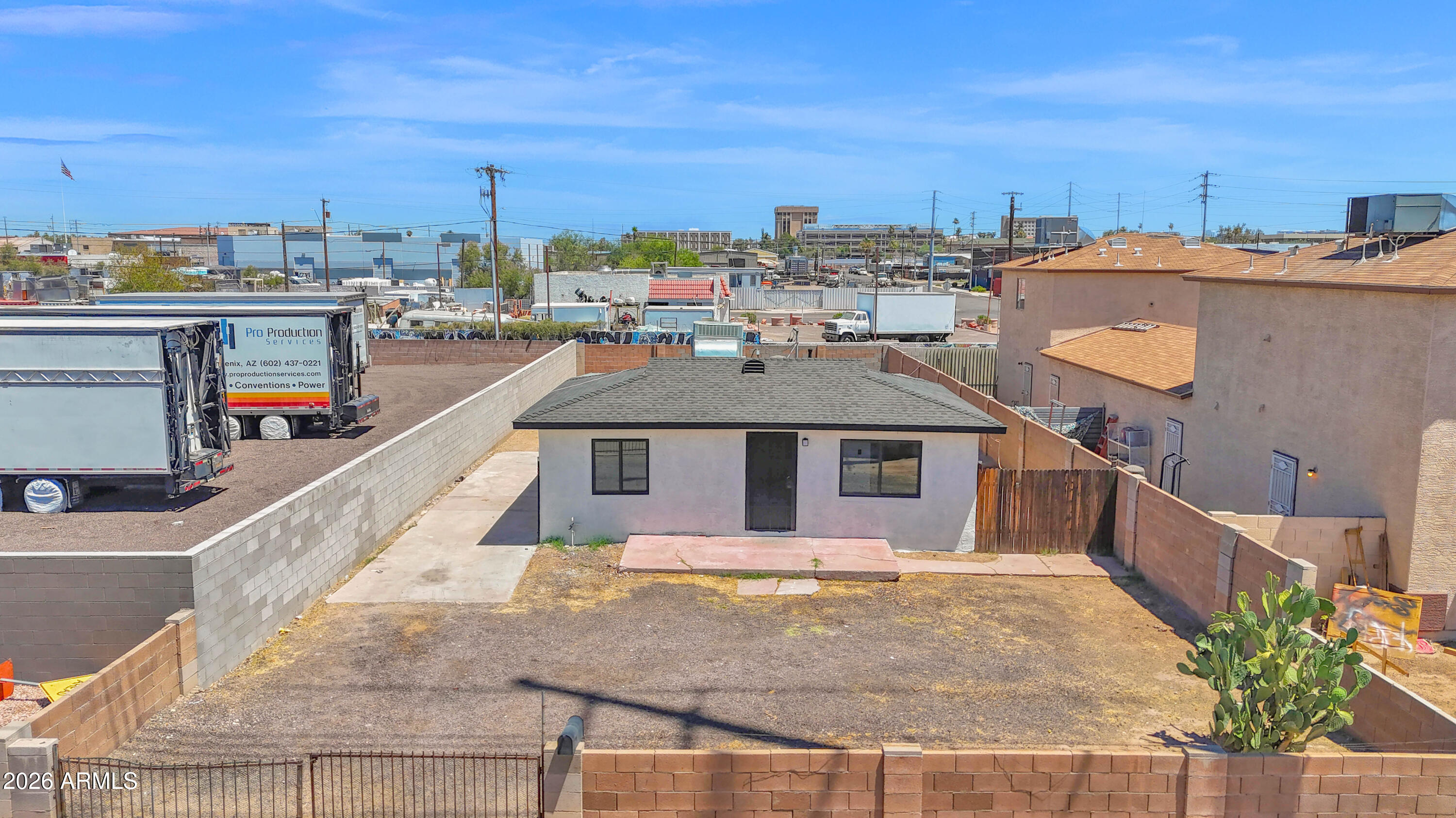 Contractor yard with office. Zoned C-3 with a ton of upside and just a tremendous opportunity for an owner user or an investor with an aggressive price point. The building could serve as office space for admin while most similar properties in the area utilize the lot in the back for parking or storage. Typical rents for this property type start at $2,500 per month NNN as seen in the proforma. The building has front parking area with freshly painted interior and exterior, new LVP flooring, updated plumbing, and a new roofing system. There is a wealth of space in the rear to add shipping containers or build a small warehouse for extra storage. The interior of the building features tile flooring, a private, full bathroom, open kitchenette, aluminum windows, and a patio.