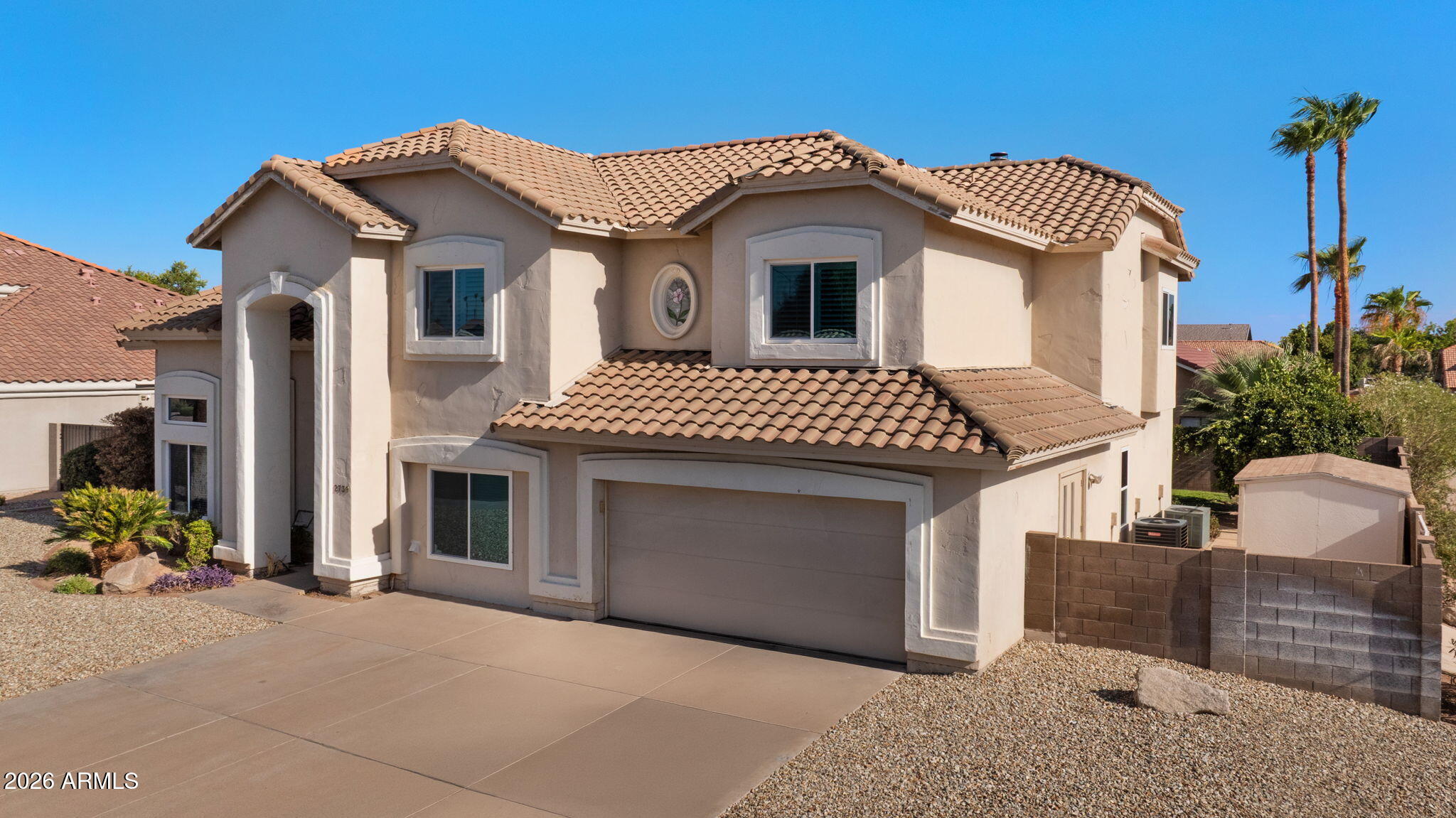 There's a reason locals refer to this pocket of northeast Mesa ''THE GROVES.'' TREE-SHADED STREETS, GENEROUS LOTS, UNHURRIED FEEL that are hard to find and even harder to get into.
FIVE BEDROOMS plus a FLEXIBLE BONUS ROOM mean the floor plan bends to whatever this season of life requires -- PLAYROOM,HOME OFFICE, GYM, GUEST SUITE, take your pick. Living spaces abound in this home. From the FAMILY ROOM with FIREPLACE and KITCHEN running together, to the LIVING ROOM with its adjacted FORMAL DINING AREA or just relax in the spacious MAIN SUITE with its own FIREPLACE, nothing says comfort like this home. PAID FOR SOLAR POWER is already in place ready to save money on Electric bills. If that isn't enough, take a dive in the POOL, enjoy the beautiful confines of a GREAT BACKYARD. Make new memories with family and friends, enjoying the pool and patio area for those functions. Special...that would be the best word to describe it!

Step outside the lot line and the location does some quiet bragging of its own. Red Mountain Park -- with its lake, shaded trails, and a long list of bird species that make it a regular stop on local birding routes -- is minutes away for the early-morning walk or the weekend you didn't plan but needed. The Loop 202 on-ramp is close enough that "easy commute" stops being a listing cliché and starts being true, whether you're headed toward Scottsdale, Tempe, or anywhere else the Valley pulls you.

Homes in the Groves don't turn over often -- ask anyone who's tried to buy one. This is your chance to find out why people stay.