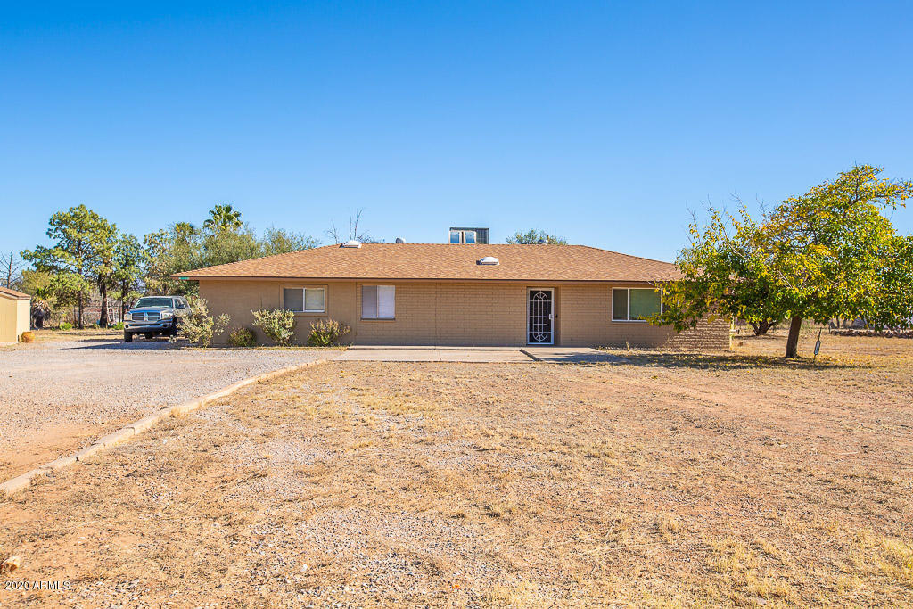 Just in time for the season... you could live on this festive street! Beautiful sight built home sitting on an acre with fenced in backyard and extra large detached workshop/garage. This very well maintained home has new shingled roof and exterior paint 2020, remodeled kitchen in 2015 in addition to newly installed new carpet, tankless water heater and water softener makes this 4 bedroom home ready for you. Additional great space can be found in the Arizona room. This house is stunning it will for sure not last.