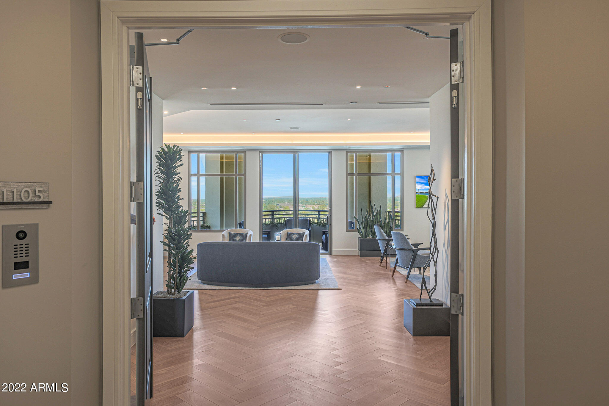 Newly renovated masterpiece located on the 11th floor of the 5 STAR RESIDENCES AT 2211. With sweeping unobstructed views of Piestewa Peak and Downtown City lights.  PREVIOUSLY OWNED BY SENATOR JOHN MCCAIN, IT IS THE LARGEST PENTHOUSE AVAILABLE IN THE VALLEY. Sitting at just under 7000 sq ft, no expense was spared in updating the floorplan and finishes.  Arguably one of the best view properties in the city, you'll enjoy expansive entertaining spaces including a full size theater room, billiards room, 500-bottle wine room and state of the art kitchen. Fully automated with a Crestron smart home system featuring custom lighting & shades throughout. Total control at your fingertips. *24 hr Concierge/Security, 5 parking spaces and storage included.