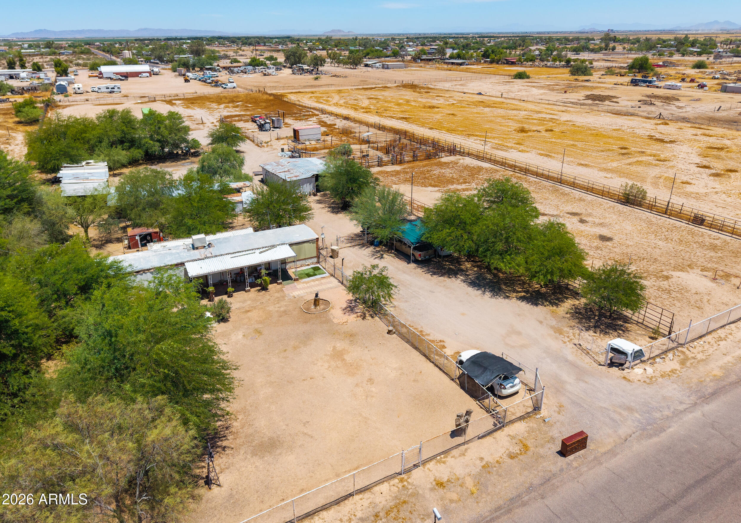 Investor Special! Incredible opportunity to own 3.3 irrigated acres in highly sought after Thunderbird Farms! Enjoy paved roads, private water company, no HOA, irrigation, stunning mountain views & a prime location just minutes from schools, shopping & dining! This fully fenced horse property features a 3 bed, 2 bath manufactured home with covered front & back patios plus everything you need for your equestrian lifestyle including covered horse pens, arena, barn, tack shed & mature shade trees! Whether you're looking to renovate, build, invest or create your dream ranch- this property offers endless potential with utilities already in place! TRULY A MUST SEE, opportunities like this don't come along often!