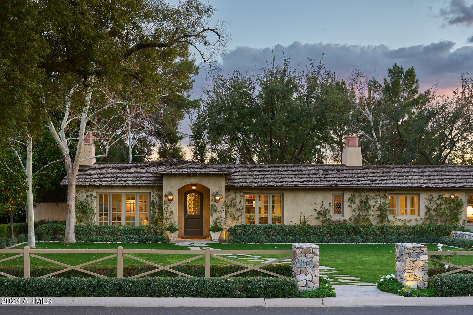 This carefully designed home is defined by a warm color scheme and a relaxed sophistication that the camera only partially captures. The outstanding and well-regarded team behind this house, including architect Mark Candelaria and interior designer David Michael Miller, were inspired by a ''Sonoma cottage.'' The best landscape designer in the Valley, Jeff Berghoff, and the homeowner worked together to create the breathtaking hardscape and landscape. The extensive refurbishment was overseen in 2009 by Nance Construction. European Oak floors, Belgian Blue Brick, rescued wood beams, a French fireplace from the 18th century, pewter door hardware, custom cabinetry, a La Cornue range, and upmarket lighting were all used throughout. This lovely house is gently tucked away in a cul-de-sac beneath large shade trees. There simply isn't anything else on the market with this degree of design integrity, quality of materials & level of construction. Must be seen to be appreciated.