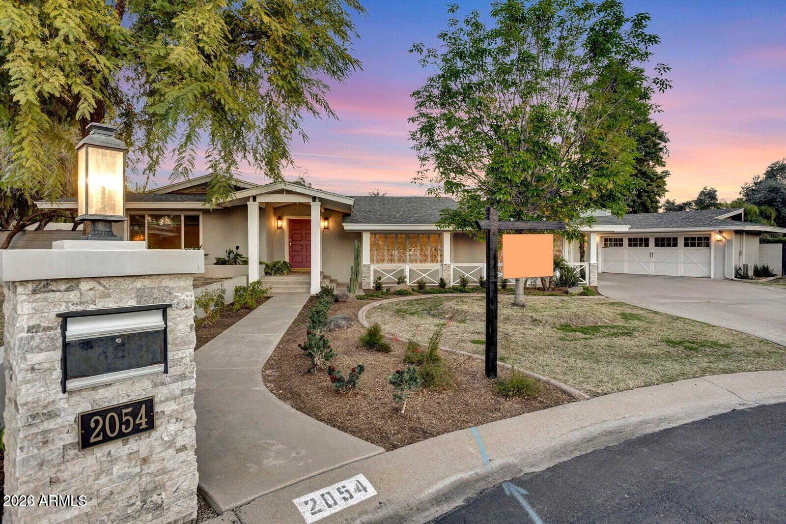 Welcome to one of Phoenix's most loved neighborhoods. Tucked into the heart of the Biltmore corridor, this beautifully maintained rental has tons of curb appeal. A home that blends warmth, privacy, and everyday livability with an outdoor setting that feels made for Arizona evenings. The oversized backyard offers room to entertain, dine under the lights, or jump into the beautiful saltwater pool, all while surrounded by mature landscaping. Inside, the home offers comfortable living spaces filled with natural light and 2 living areas, great for entertaining or relaxation. This is the kind of location people move to Phoenix for. Just minutes from the area's best restaurants, coffee shops, fitness studios, golf, hiking, and shopping. All within minutes of Downtown, Scottsdale, and the airport. * Rent includes landscaping and pool services. *

Located in the sought-after Biltmore area, 2054 E Rancho Drive offers a rare combination of neighborhood charm, central convenience, and inviting outdoor living. Set on a quiet street surrounded by established homes and mature trees, the property feels tucked away while remaining close to everything that makes central Phoenix desirable.

The backyard is truly the centerpiece of the home, spacious, private, and designed for the Arizona lifestyle with a large covered patio and outside grille and firepit. Whether hosting friends for dinner outdoors, enjoying weekend mornings with coffee on the patio, or spending evenings around a firepit under the string lights, the setting creates a sense of comfort that's difficult to replicate in a typical rental.

Inside, the home offers a functional layout with bright living spaces, comfortable bedrooms, and a natural flow between indoor and outdoor areas. The atmosphere feels relaxed, welcoming, and easy to live in.

Residents will appreciate immediate access to some of Phoenix's favorite local destinations including the Biltmore Fashion Park, The Camby, Arizona Biltmore Golf Club, popular Arcadia and Biltmore restaurants, boutique fitness studios, hiking trails, and neighborhood coffee shops. The location also provides convenient access to Downtown Phoenix, Scottsdale, Camelback Corridor employment hubs, and Sky Harbor Airport.

For renters looking for more than just a house, something with character, warmth, and a neighborhood people genuinely enjoy being part of...this home delivers.