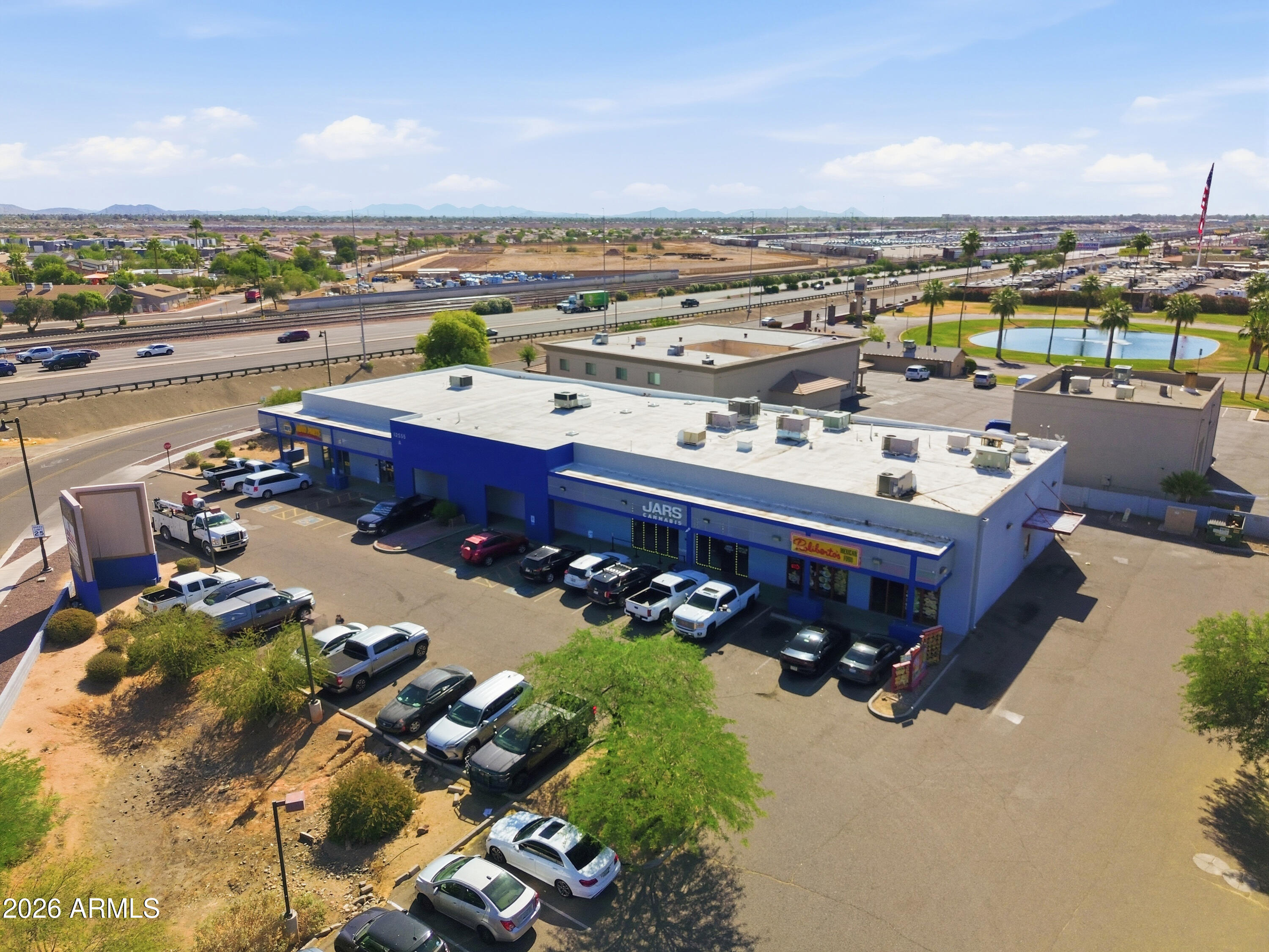 GRAND AUTO CENTER - Commercial Sale
