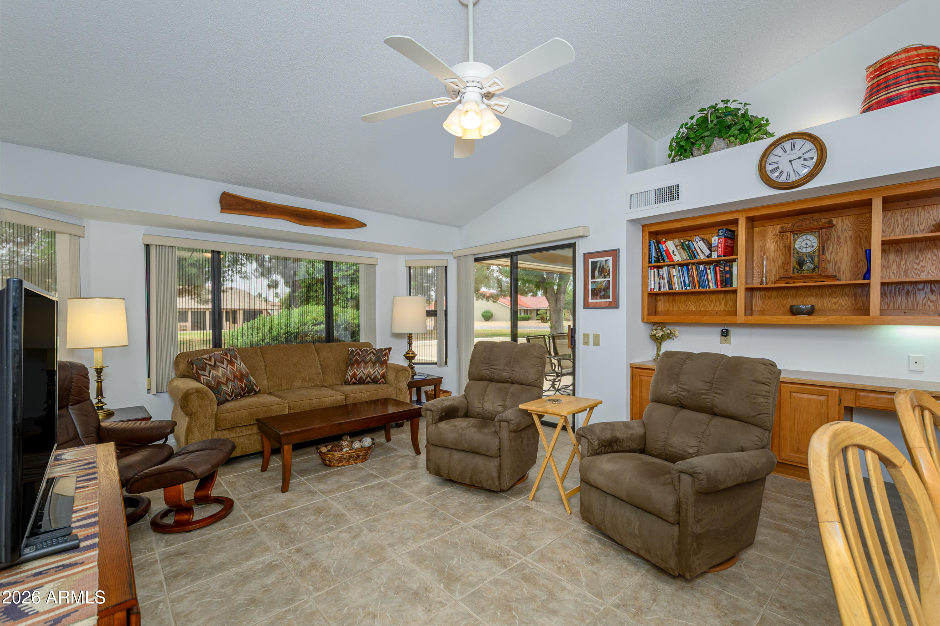 If you want to reside in the vibrant center of Sun City West, AZ, then this might just be the home for you. Home is centrally located in the Grandview Golf Course section of the city & close to shopping, churches, recreational & medical facilities. This popular Aspen model duplex features 2 bedrooms, 2 bathrooms & an office/craft room. Primary suite has a large walk-in closet, dual sinks, bay window & access to the gated south facing back patio. The home is designed for both formal & casual entertaining with the living/dining area combination & the large family room. Both spaces have access to the covered back patio. Interior paint 2026 & new HVAC 2025. Enjoy the benefits of the assumable solar lease. Home is being sold furnished. Make arrangements today to view this home!