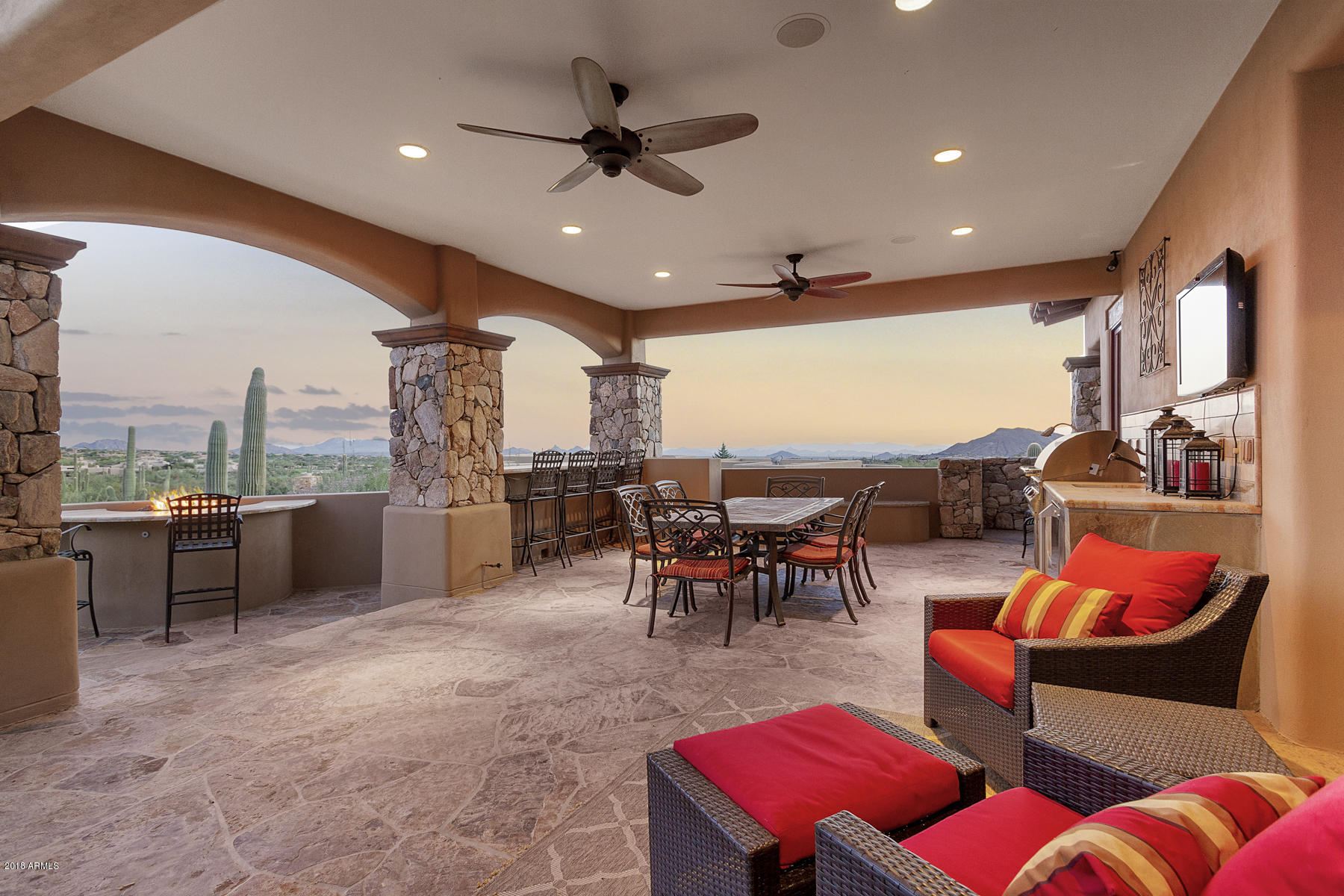 Amazing home with exquisite finishes is a masterpiece of Desert Mountain understated elegance. Only appropriate for those with a discerning eye to know the quality construction and fine materials such as Alder doors and Alder inlaid ceilings, semi precious stones as bezel for mirrors and hundreds of additional Luxe details. Beautiful wine cellar. Modern features abound such as solar power and over 35 feet of telescoping window wall. Master bath includes a romantic outdoor shower.