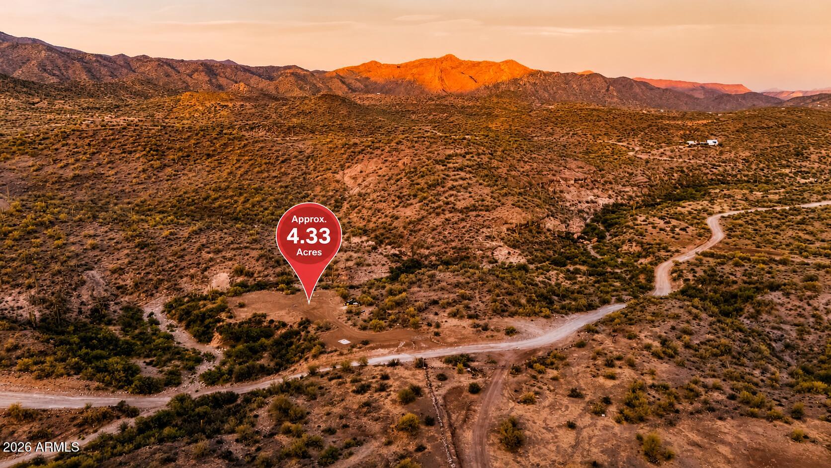 4.33 acre residential lot in Pleasant Country Ranches in Morristown. Private well approx 35 GPM. Level buildable pad, county road access. If you are looking for usable land with water already in place, this 4.33 acre parcel in Pleasant Country Ranches offers a clear starting point. Located in Morristown in Yavapai County, the property includes a private domestic well producing approximately 35 gallons per minute, reducing one of the most common unknowns when buying land. Compared to many parcels in the area, key infrastructure steps like water and initial site preparation are already in place. 
The site features a defined, level buildable pad that has already been cleared, making it easier to plan a future home. The surrounding terrain includes a mix of level and gently sloping areas alon with a natural wash that runs through part of the property. The existing well and cleared pad provide a defined starting point for building, allowing buyers to move directly into planning and site layout. From a development standpoint, the property is zoned for single family residential use with basic CC&Rs in place, available in the listing documents, which allow site-built homes while restricting manufactured homes, permanent RVs, and trailers. 
At the time of drilling, the well produced approximately 35 gallons per minute and was described by the installing company as a strong producing well. Additional well details, including depth and water quality information, are available in the listing documents, and buyers may verify performance during due diligence.  Access is via a county maintained dirt and gravel road, improving year round usability compared to many rural parcels. The property is partially fenced and partially cleared, with a defined build area already in place for planning your future home. The land includes native desert vegetation, saguaro, and open mountain views, with multiple potential build orientations. The location provides access toward Lake Pleasant, Crown King, and Castle Hot Springs, offering a balance of rural setting and regional access for recreation and services.

Buyer to verify all facts, utilities, access, flood zone status, and development requirements during due diligence.