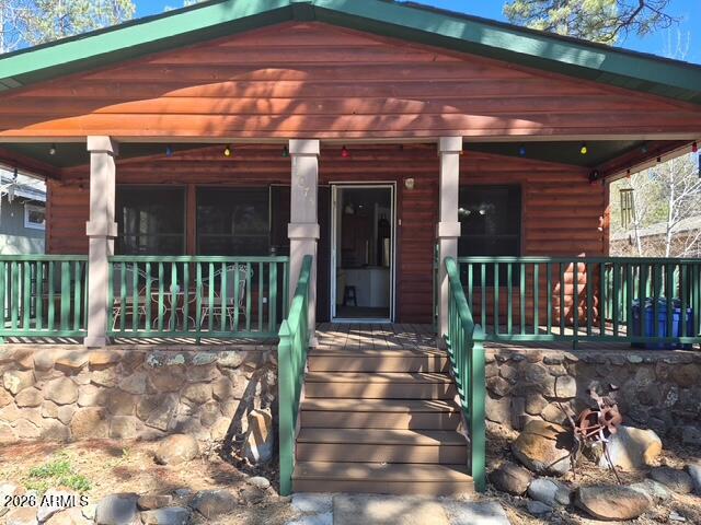 Don't miss this one Very quiet Cul De Sac location with a very short walk to the  Forest entrance. Log sided , 3 bed 2 bath  Great Room with vaulted ceilings and a gas fireplace. Kitchen features stainless appliances and a gas stove, microwave 
dishwasher and an abundance of cabinets.  Oversized master and a large closet. Large Master Bath has a soaking tub and a separate shower. Inside laundry and a very nice out building in the back. Just sit on the front porch and enjoy the peace and quiet of the cool pines!