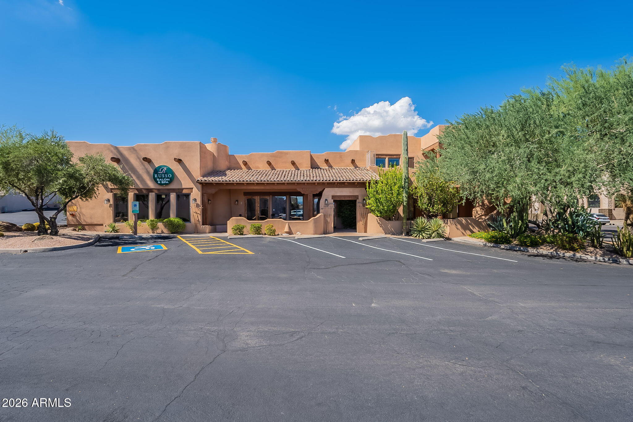 Extraordinary live-work opportunity located in Fountain Hills. This well-maintained property offers significant versatility for various professional or residential uses.

The first level currently functions as a salon, featuring several treatment rooms equipped with sinks. It includes an outdoor bathroom and an outdoor living space complete with a fireplace.

The second story, completed in 2025, provides additional living space consisting of one bedroom, a dining area, and a living room. This level features a fireplace, in-unit laundry facilities, and a clear view of the Fountain Hills fountain.

Given the unique nature and high quality of this space, it is certainly worth a Tour.