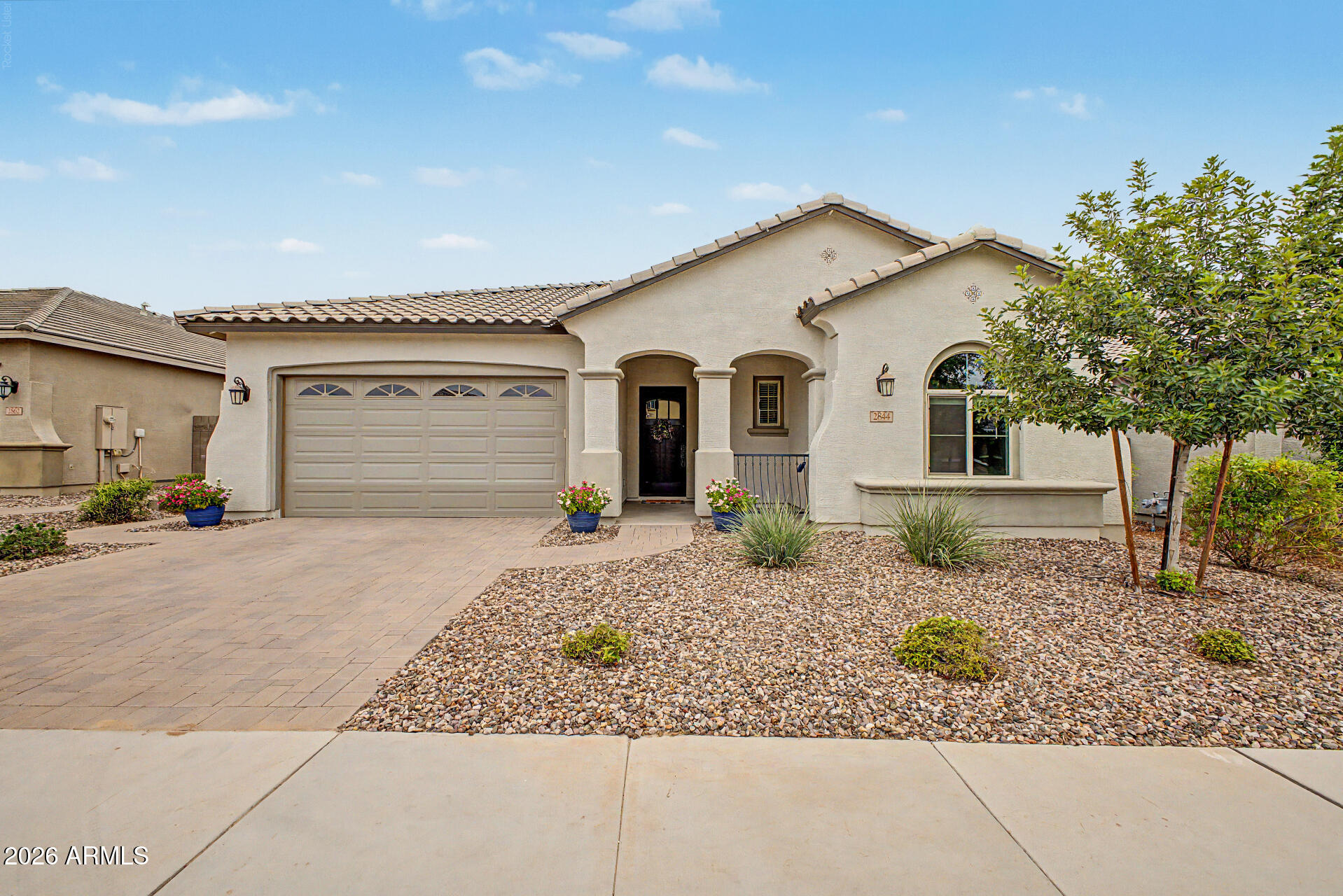Fall in LOVE with this beautiful 4-bedroom home in Promenade! A low-care landscape and a 3-car garage w/paver driveway are just the beginning. Discover inviting living spaces paired with a large sliding window for abundant natural light throughout! The impressive kitchen boasts upgraded appliances and cabinetry for ample storage. The wine fridge is an added bonus. Enter the main bedroom to find an ensuite with all the must-haves. If you want to relax or enjoy BBQ, the backyard awaits you! A covered patio, artificial turf, rose garden, and multiple seating areas complete the picture. Don't miss this opportunity!