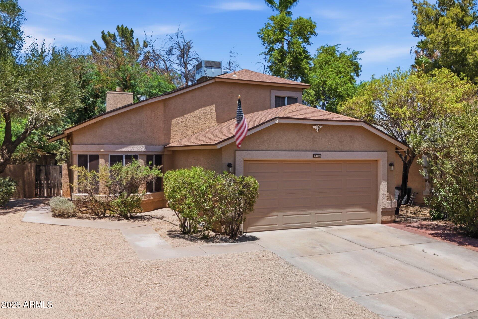 Turnkey, upgraded 3-bedroom, 2.5-bath home on an oversized cul-de-sac lot in the highly desirable 85050 zip code!  This move-in-ready, popular floor plan features a downstairs primary suite with a spacious walk-in closet and huge custom shower. The great room offers a cozy fireplace & opens to the kitchen with granite countertops, a pantry & abundant cabinetry. Upgraded wood-look tile flooring, brand-new carpet, owned solar with 15 years left on the transferable warranty & water softener add comfort & efficiency. Enjoy the community pool & spa, plus an expansive backyard with room to relax, entertain or create your dream outdoor space. Minutes from Desert Ridge Marketplace, High Street, the Mayo Clinic, shopping, dining, parks, & easy freeway access. Low HOA fees.