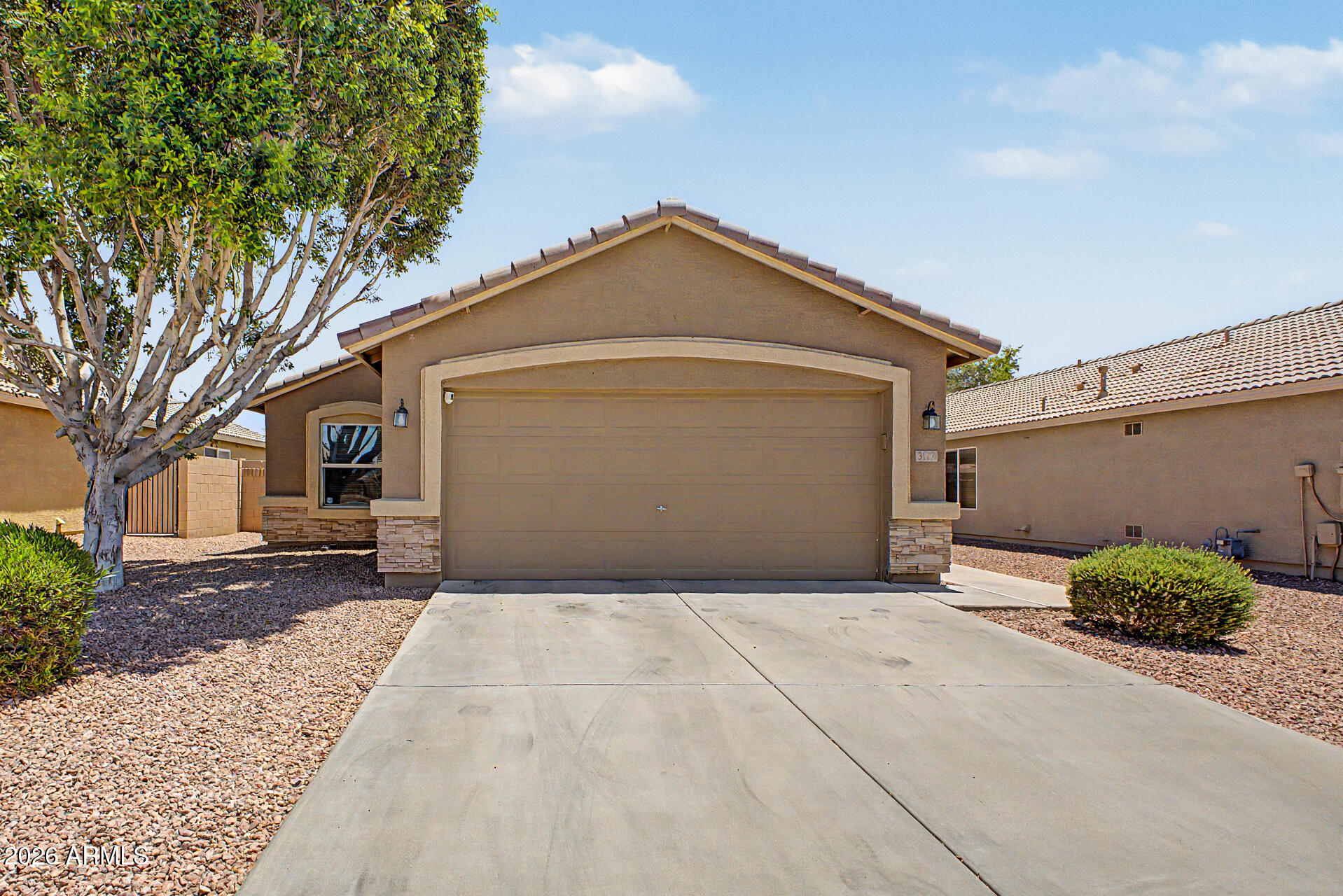 Charming and well-maintained, this bright and inviting 3 bedroom, 2 bath home offers 1398 sq ft. of comfortable living space with an open concept design and soaring vaulted ceilings that create an airy feel throughout. The desirable split floor plan provides privacy and functionality, while the easy - maintenance backyard is perfect for relaxing and entertaining. Conveniently located near abundant shopping, dining, parks, and top- rated schools, this home offers both comfort and convenience. Whether you're looking for your first home, a seasonal retreat or seeking an investment opportunity, this gem is ready to welcome its next owner!