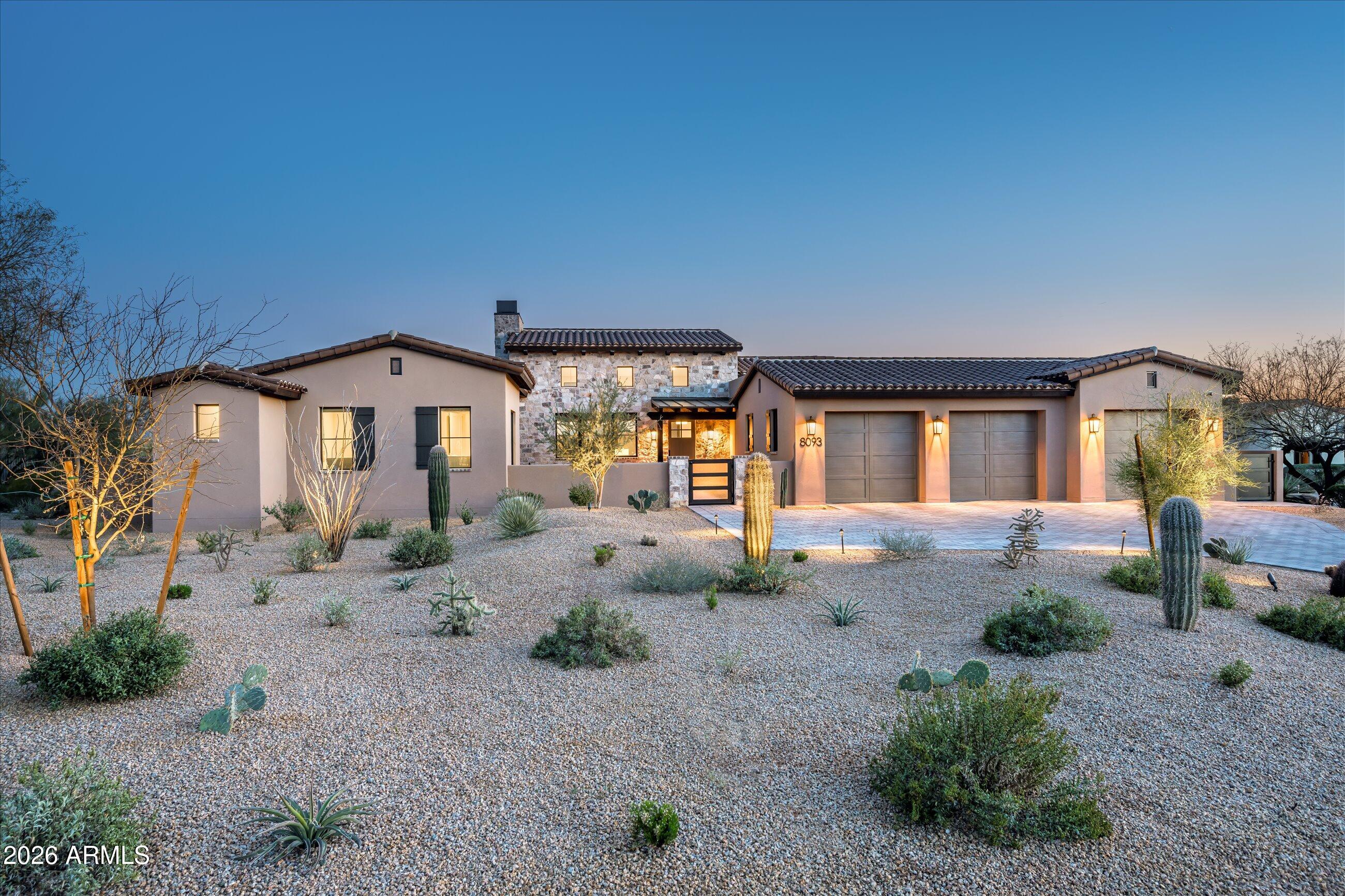 First time on the market, this exceptional residence is ideally situated on a premium south-facing homesite within the guard-gated community of Whisper Rock. Built by Platinum Companies and thoughtfully designed by PHX Architecture, the home features a private owner's suite with an adjacent office, along with three spacious guest suites. A beautifully appointed kitchen seamlessly connects to the dining/living areas. Expansive walls of stacking glass open to a generous covered patio, creating effortless indoor/outdoor living, complete with a built-in BBQ, fire pit, and water feature.  A harmonious blend of warm natural finishes, refined contemporary touches, high-end materials, and custom wall coverings is showcased throughout. An oversized three-car garage completes this exceptional Villa.