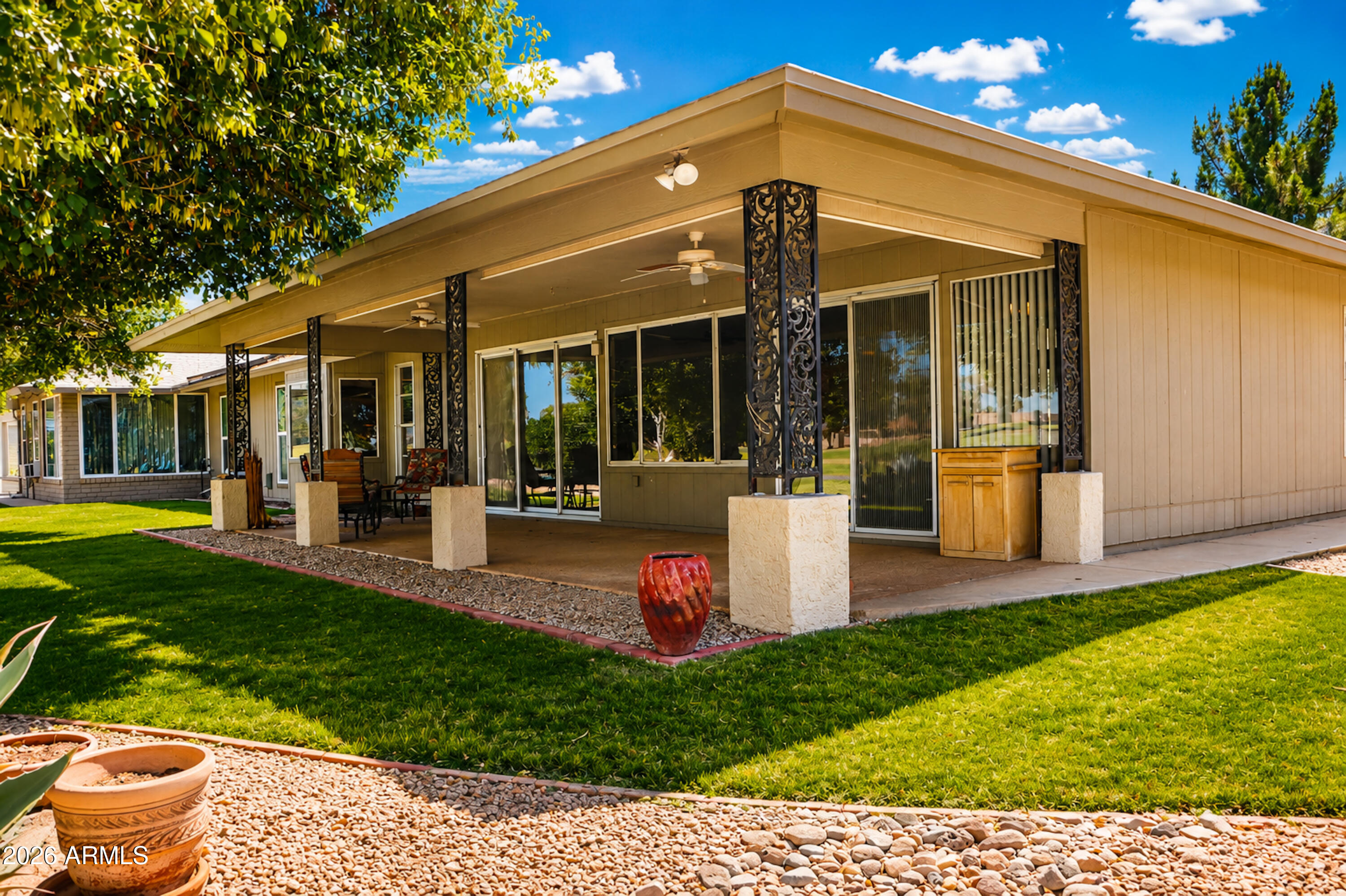Experience easy AZ living in this spacious golf course Gemini Twin Home in Sun City West! One of the largest Gemini floor plans at 1,811 sq ft, this well-maintained 2beds/ 2 bath home offers generous living spaces, abundant storage and beautiful golf course views. Kitchen features newer cabinetry, neutral Corian countertops, some newer appliances & double ovens. Flexible bonus space works perfectly as an office or formal dining room. Expansive great room easily accommodates multiple seating and dining areas. Both bedrooms feature walk-in closets, and a custom added door gives the guest bedroom ensuite-style bath access. Enjoy a private front courtyard, extended covered back patio overlooking the golf course & HOA roof replacement was completed in 2020.  Active Adult living at its best!