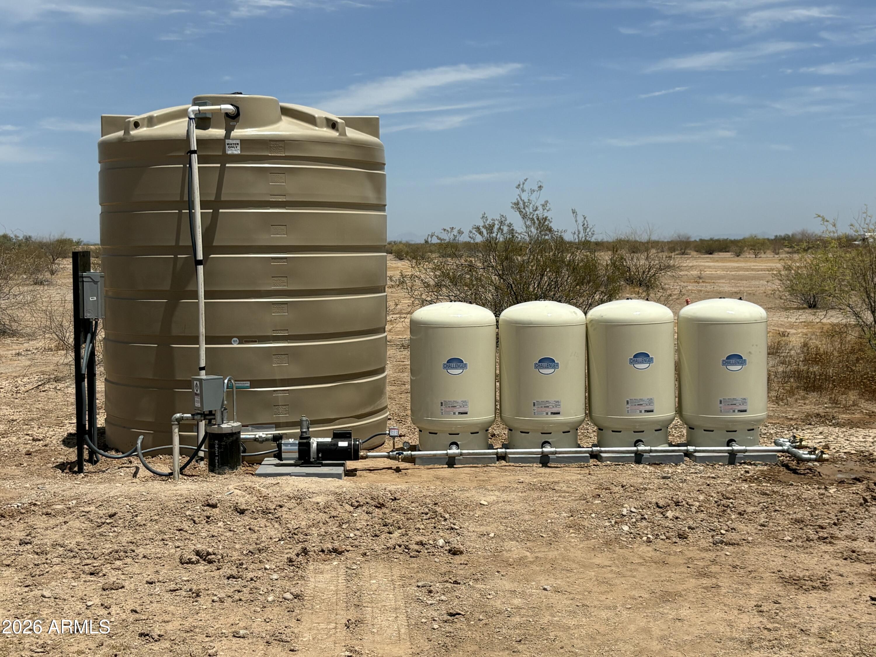 1.05 acre property. No FEMA Flood plain. Flat, Power very close. Property is located in Surprise Municipality. 

Fully functional well, with pump, pressure tank, and storage tank all installed. 

APN: 503-81-983
Coordinates: 33.719418, -112.574431