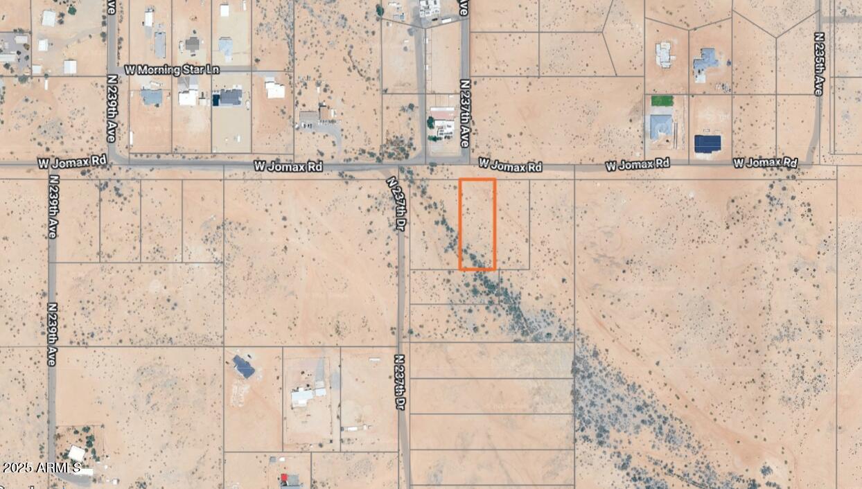 2nd lot from the corner of W Jomax Rd & N 237th Ave in West Surprise w/power at the pole! 1 acre parcel w/frontage on W Jomax Rd. Great opportunity for building your horse property or for anyone seeking to create their own oasis or multi-use compound. Close enough to the city yet totally rural. This land is outside the Luke AFB building restrictions. Each lot has a buildable portion for a residence & casita or outbuildings above the flood flow zone. Additional 4 parcels are available - 2 at 1 acre each, 1 at 1.47 acres & 1 flag lot w/ 4.22 acres w/frontage on two streets. See the docs tab for recorded plat plan, Surprise zoning & custom home plans. Additional parcels are 503-83-892, 503-83-894, 503-83-895 & 503-83-896. Bundle parcels into one deal for up to 9 acres. Build your dream now!