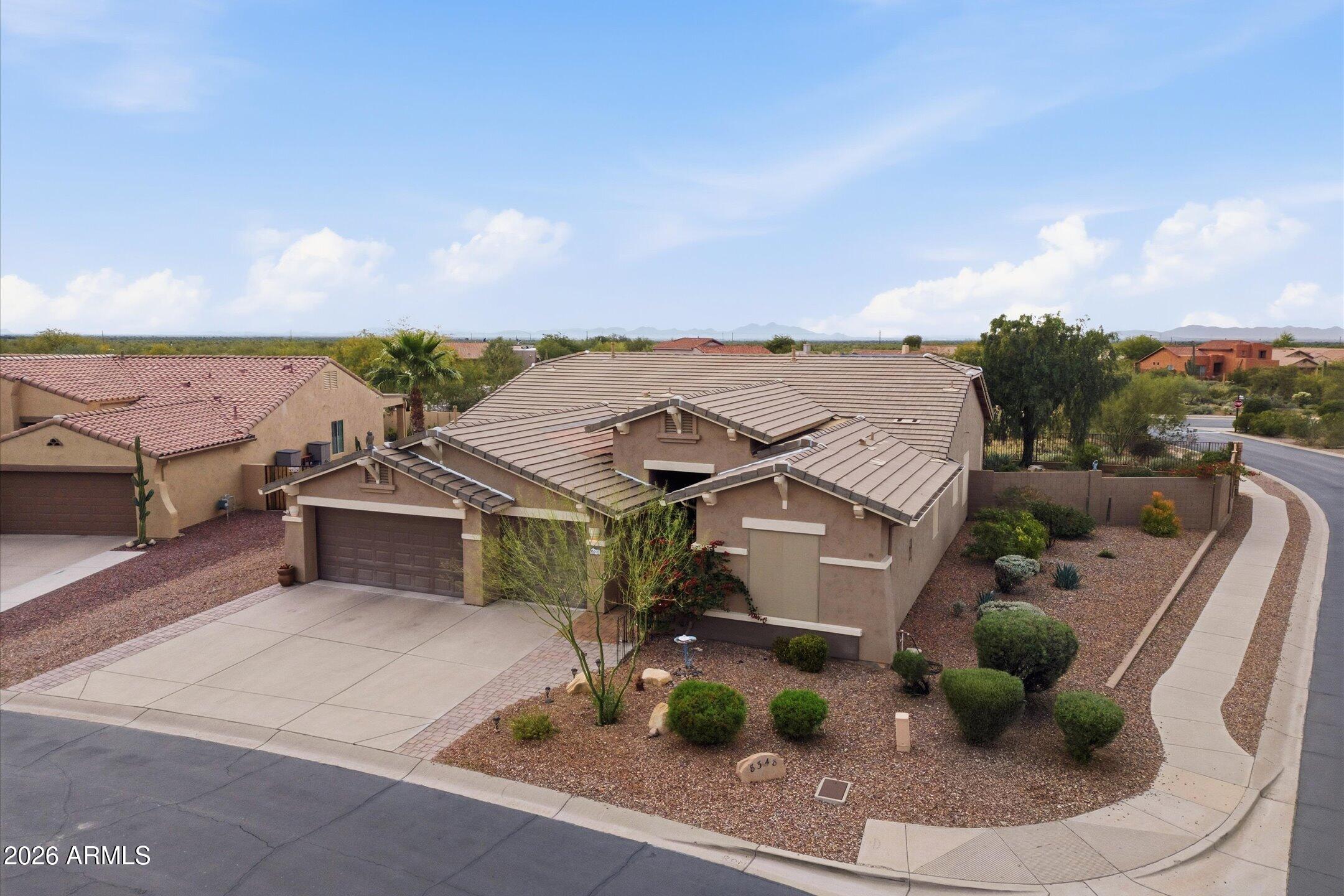 This 2600+ sq.ft 4-bedroom, 3-bath home perfectly balances privacy and togetherness, making it ideal for entertaining and for multi-generational living.  Set on a large lot with a three car-garage, the LOCATION and SIZE of this Peralta Trails home are just a few of the things that make it special.  New roof in 2024, new Trane HVAC in 2024 with a transferable 10-year warranty.  Enjoy the split floor plan and the upgrades inside and out in this VERY special home located in a gated area.