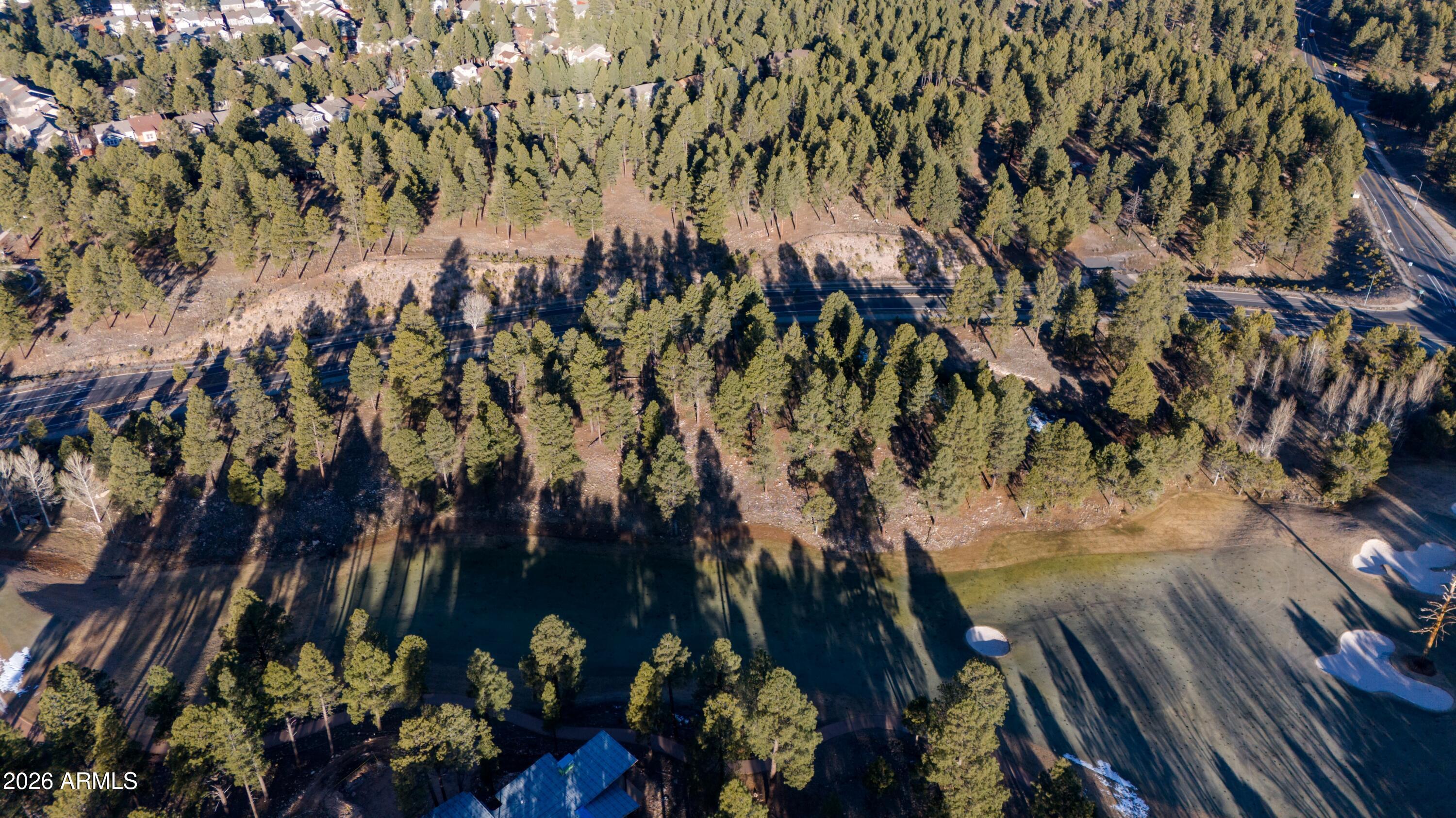 Introducing Tract 25 --an exclusive 3.2-acre enclave within Pine Canyon, thoughtfully planned as six homesites ranging from .29 to .74 acres. Ideally situated along the 14th fairway, this limited offering blends sweeping golf course views with the natural beauty of towering pines and expansive mountain skies. As part of the vision for this enclave, the developer is working collaboratively with the City of Flagstaff to refine the original 4.3-acre parcel. Approximately 1.1 acres will be dedicated back to Pine Canyon Club, further enhancing open space, view corridors, and the overall sense of privacy and integration with the course.
Each homesite offers a unique balance of scale and orientation--creating an ideal canvas for custom mountain architecture. Tract 25 presents a rare opportunity to build within a refined golf course setting while enjoying the serenity and prestige of this premier private community.