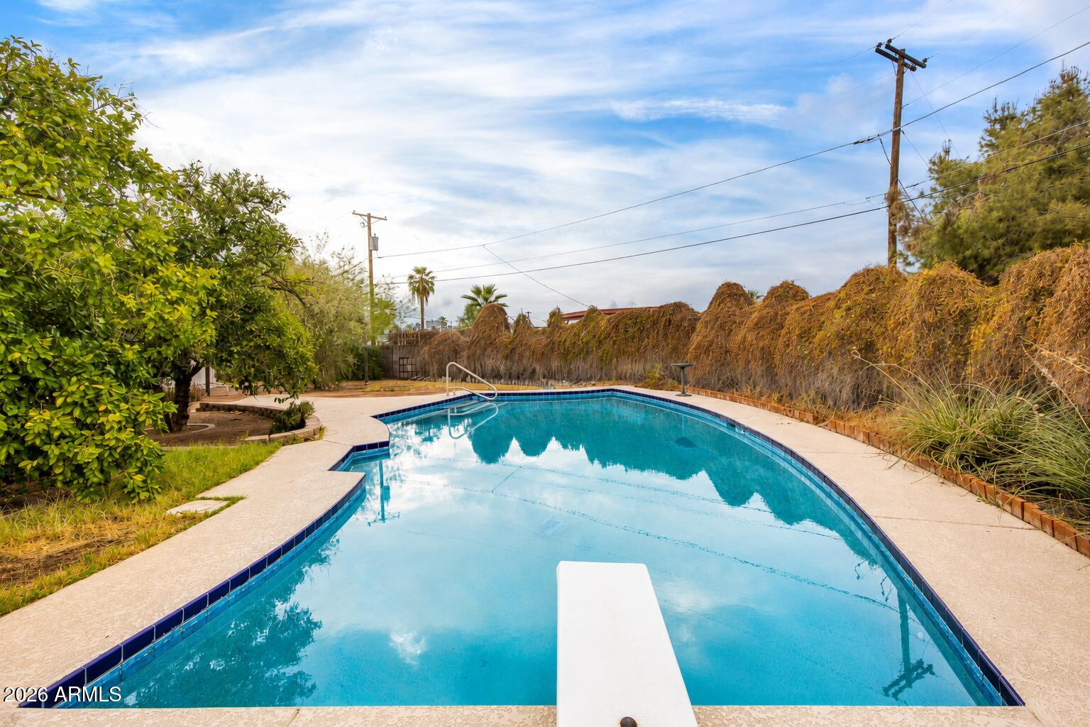 Situated on one of the largest lots in the neighborhood, this 4-bedroom, 2.5-bath home presents a rare opportunity to create a stunning modern residence in the heart of South Scottsdale. Included with the sale are professionally designed architectural plans, construction drawings, and luxury concept renderings, with permit submission to the City underway. The seller is also willing to complete the renovation, allowing the buyer to customize finishes and design selections. Major updates completed over the years include the roof, sewer line, windows, HVAC, water heater, and pool. Minutes from Old Town Scottsdale, Loop 101, premier dining, shopping, golf, and entertainment.