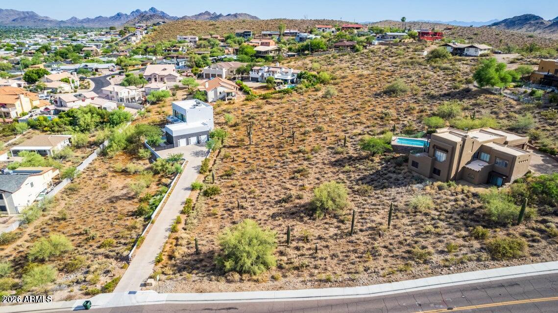 Discover the perfect canvas for your dream home on this nearly one-acre lot, where breathtaking mountain views provide the backdrop for your custom vision. With ample space to build, you'll have the freedom to create the home you've always imagined, complete with lush landscaping, and room to make it uniquely yours. Opportunities to own a parcel like this are few and far between--don't miss your chance to turn this exceptional property into something truly special.