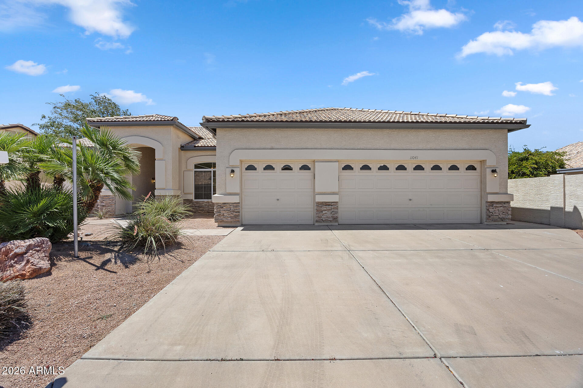 Enjoy resort-style living in this beautifully maintained 3-bedroom, 2-bath home located in a vibrant adult lake community! Featuring owned solar, stunning curb appeal, and 1,637 sqft of comfortable living space on a spacious 9,321 sqft lot, this home offers the perfect blend of relaxation and functionality. The split primary suite includes a full bath with separate tub and shower for a peaceful retreat. Outside, the oversized 3-car garage with built-in storage adds convenience, while the extended covered patio provides plenty of south-facing shade for year-round enjoyment. Entertain with ease using the built-in BBQ and enjoy the low-maintenance backyard setting. Community amenities include a clubhouse, lake, fitness center, and more--perfect for active, carefree living!
