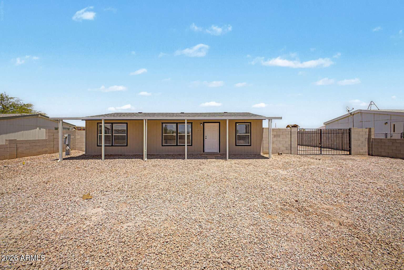 Move-in ready home in Arizona City with thoughtful recent improvements throughout. This property features brand new stainless steel appliances, new wood like laminate flooring throughout, a new roof, fresh interior and exterior paint, updated ceiling fans, and new faucets. The spacious yard offers plenty of room to enjoy the outdoors and includes a covered patio, RV gate, and storage shed. Situated on a nice size lot, this home offers great outdoor space with endless potential for entertaining, parking, or future use.