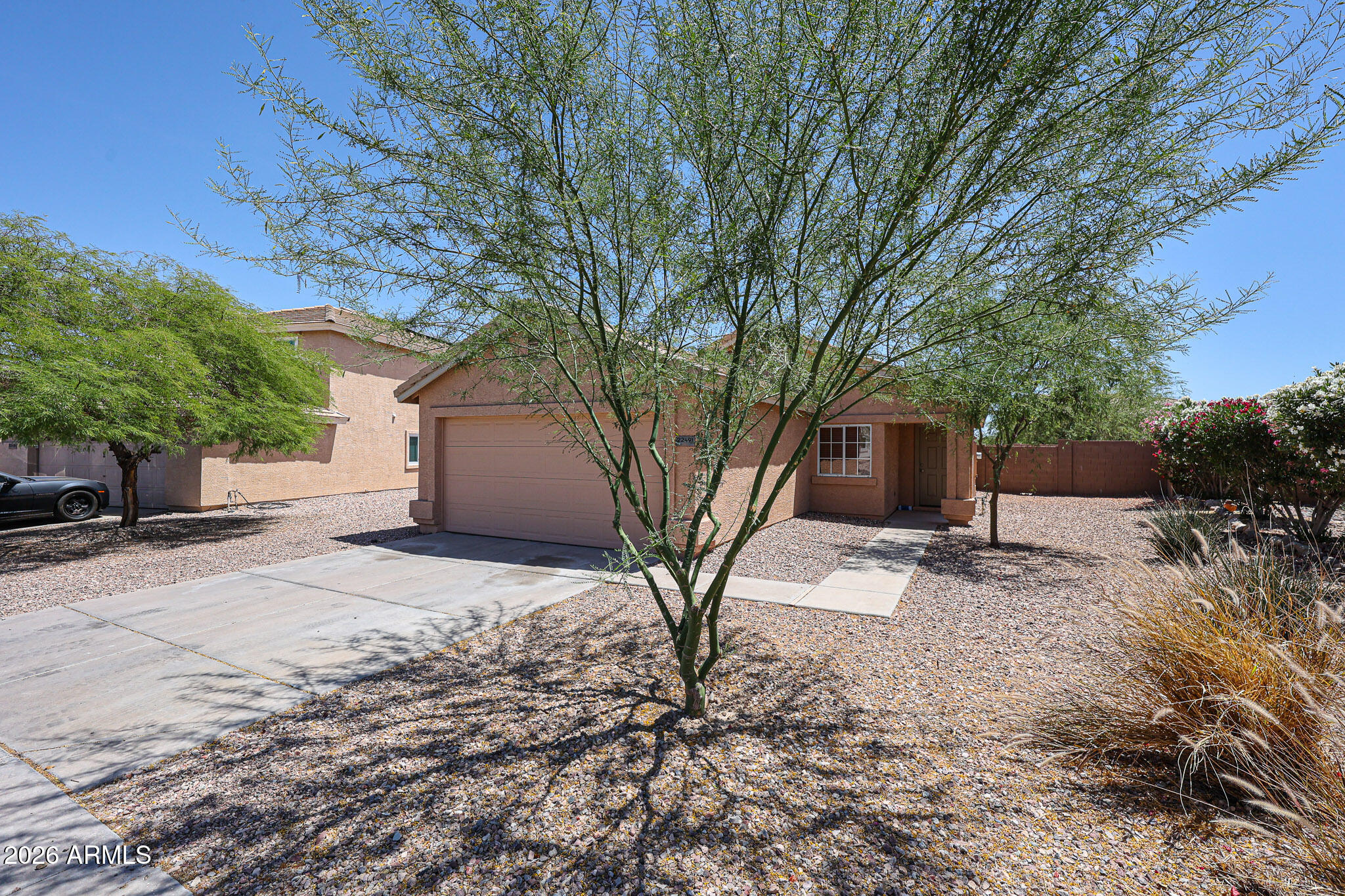 Charming single-level 3-bedroom, 2-bath home offering a functional great room floor plan and ideal north/south exposure. Interior features include slate flooring in main living areas, new carpet, fresh interior paint, and new appliances. The bright kitchen opens seamlessly to the living space--perfect for everyday living and entertaining. Enjoy added comfort with ceiling fans, and a covered patio for outdoor relaxation. Complete with an electric garage door opener and move-in ready condition, this home delivers both value and convenience in a well-designed layout. Brand new garage door with new garage door opener.