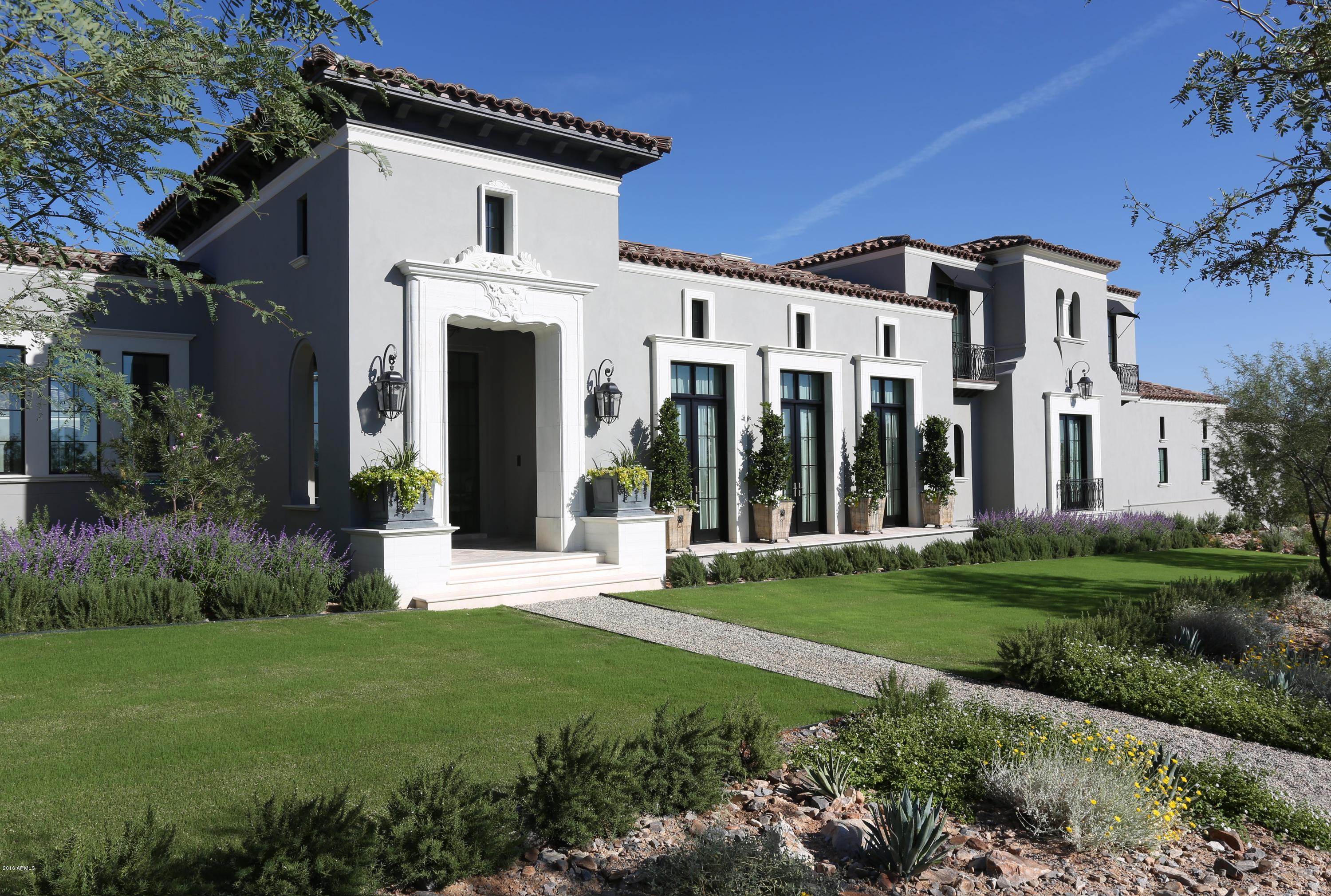 Rounding the corner to the Silverleaf club is one of the most spectacular homes in the valley. The Horseshoe Canyon location is exceptional, as is the timeless style and craftsmanship.  This classically refined 7,600 square foot Formal Mediterranean Salcito Custom Home with interior design by Rebecca Salcito and architecture by Dale Gardon Design is a masterpiece. The estate style (1.70+ acres), lush gardens, open, natural light filled, flexible floor plan and exceptional finishes make this home a truly one-of-a-kind opportunity.