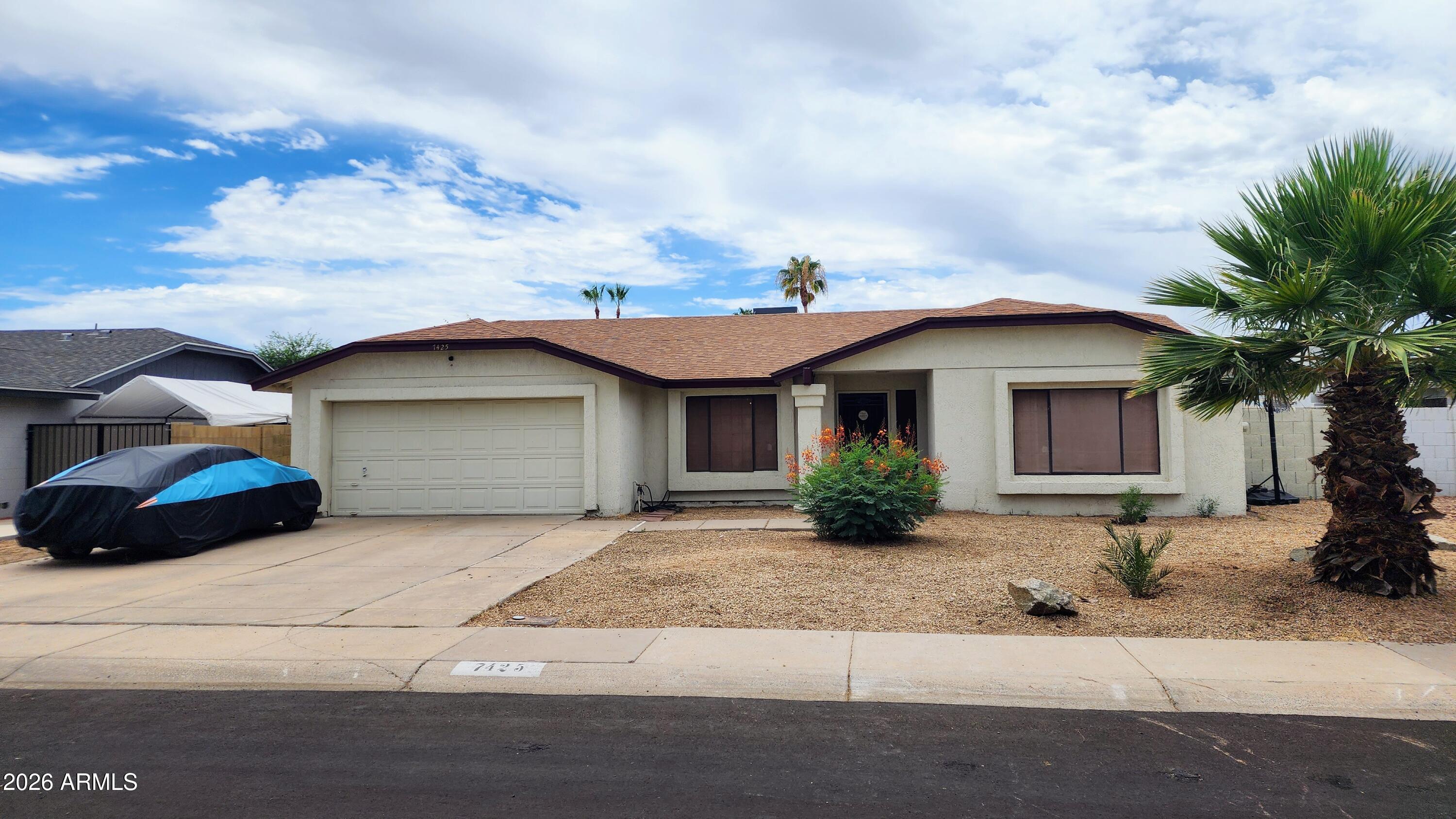 Fantastic value in a desirable Peoria neighborhood! This spacious 2,097 sq. ft. home offers 3 large bedrooms plus a generous den that can easily serve as a 4th bedroom. The well-designed layout features a private living room with an elegant light fixture, a large family room, and an open kitchen with all appliances included. The oversized primary suite boasts a walk-in closet, sitting area, and Arcadia door leading to a covered patio and backyard. Enjoy ample RV parking space on either side of the home. Conveniently located near shopping, dining, and Loop 101. Major updates include a newer roof and one HVAC unit replaced in 2022. With its size, layout, and location, this home is an exceptional opportunity. Make it yours, start now.