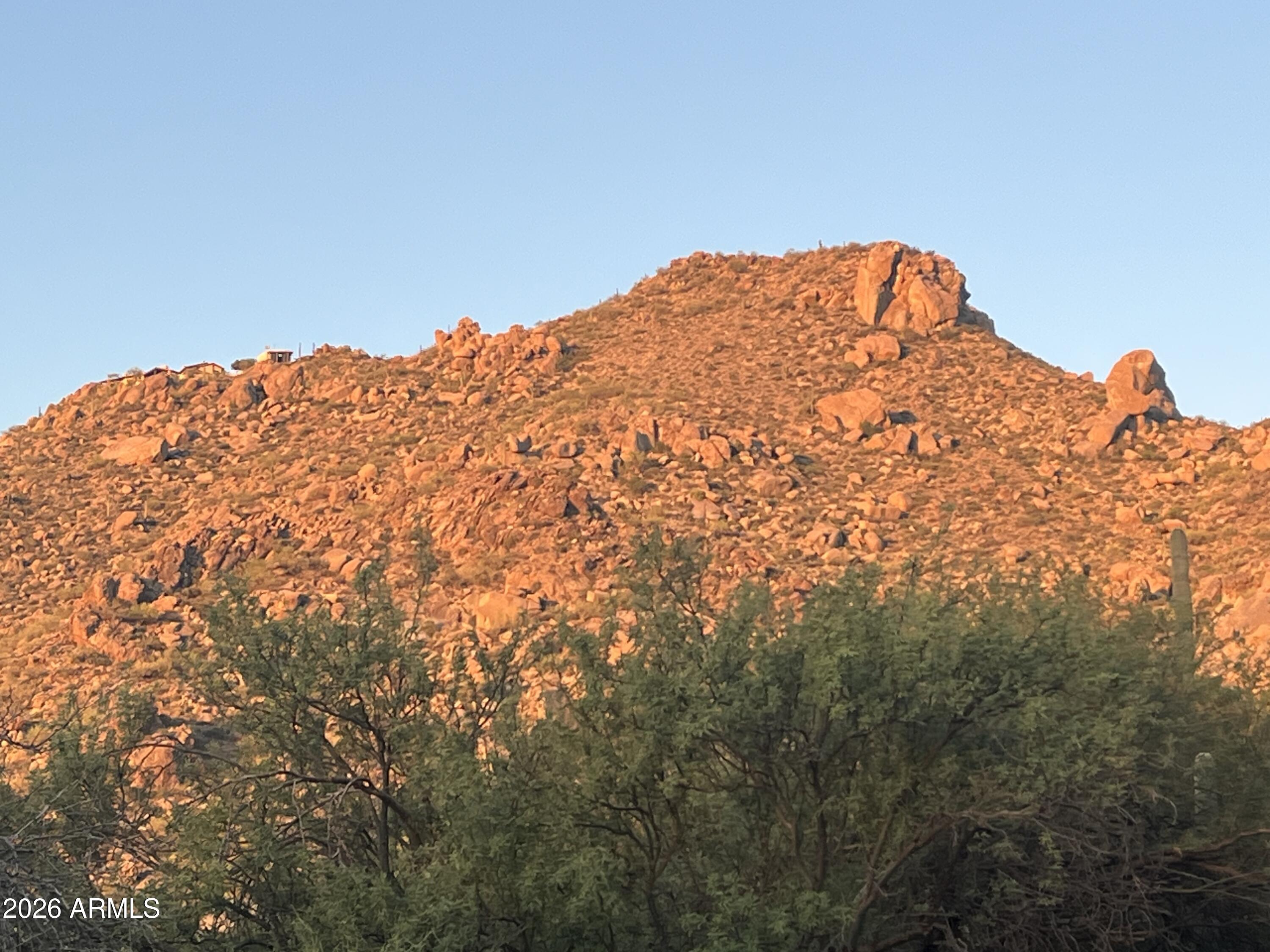 Back on the Market-This 1.68 acre vacant lot is located near the downtown Carefree area with lots of mountain views.  It is at the base of Black Mountain and is a perfect addition to the adjacent home/lot also for sale.