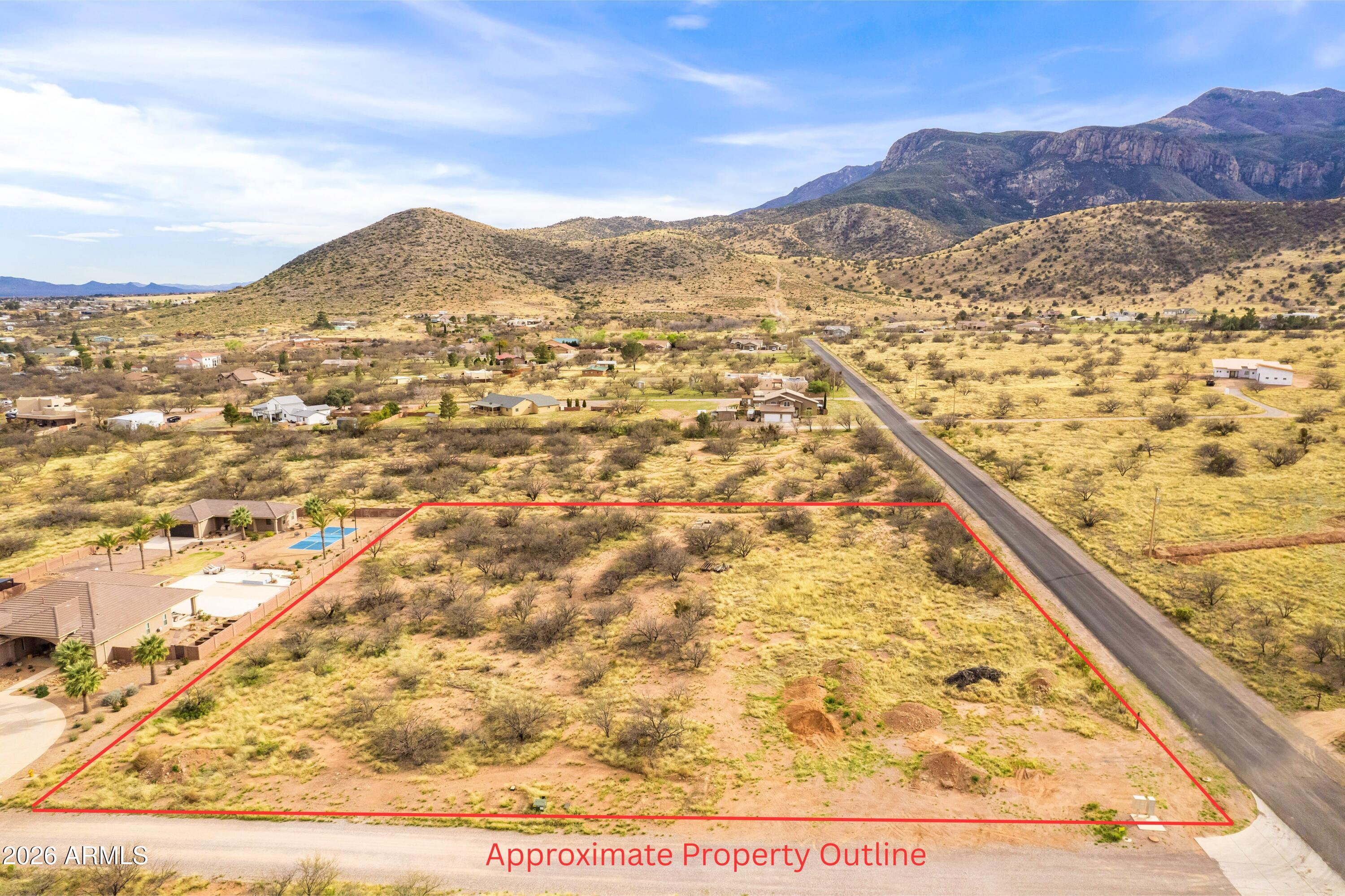 2 ACRE LOT IN RAMSEY CANYON WITH A WATERFALL VIEWS!!!  PRIVATE WATER CO AND ELECTRIC AT THE PROEPRTY!!  HURRY, ALL THE CANYON PROPERTY IS BEING BOUGHT UP AND WE ARE NOT MAKING ANYMORE LOTS WITH VIEWS LIKE THIS!!  CALL ME and lets Build your dream home in the highly sought-after Ramsey Canyon area with breathtaking, unobstructed views of the Huachuca Mountains! This 2 acre lot offers the perfect blend of privacy and convenience, located close to town with water hookup (cost available) and electric already in place. Partner with Sun Canyon Homes to select your ideal floor plan and start creating the home you've always envisioned. Lots featuring water, power, and spectacular mountain views are becoming increasingly rare. Don't miss this opportunity. Secure your slice of Arizona paradise today