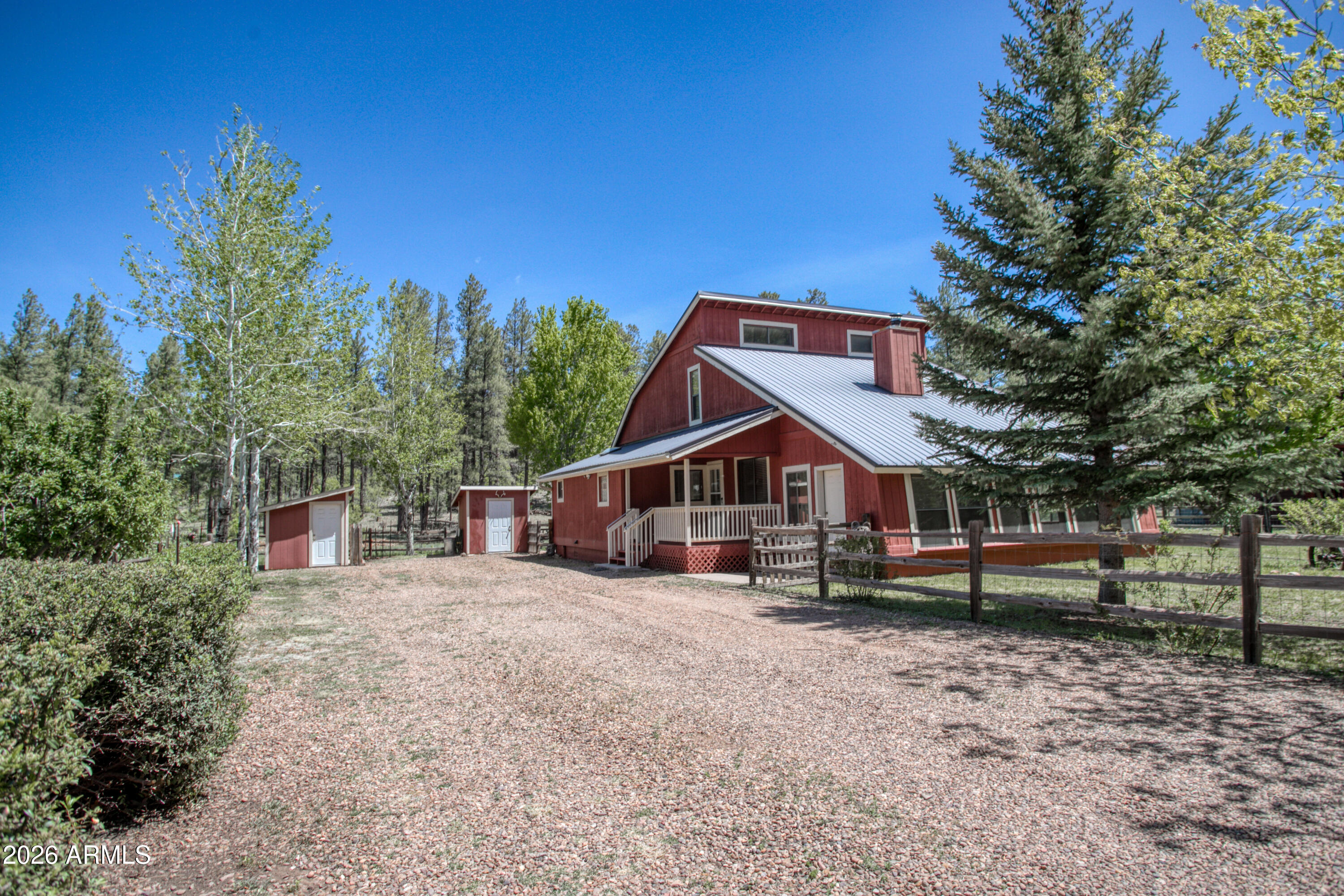 Backing directly to the National Forest and surrounded by towering pines, this charming Sky Hi Retreat offers the perfect blend of privacy, character, and mountain living. Featuring 3 beds, 2 bathrooms, and 2,257 square feet, this unique cottage-style home sits on a .33-acre lot that feels much larger thanks to the expansive forest backdrop and serene natural setting. Inside, soaring vaulted ceilings, skylights, and abundant natural light create a warm and inviting atmosphere. Spacious living areas provide plenty of room for gathering and entertaining, while the bonus sunroom offers the ideal space to relax year-round and enjoy peaceful forest views. Distinctive architecture and mountain charm are found throughout, making this home a truly special retreat. Whether you're looking for a full-time residence, vacation getaway, or investment opportunity, this property delivers the best of mountain living with unmatched access to nature right out your back door.

Additional features include an ETS Energy System, covered deck, patio, split rail fencing, and two storage buildings. Whether enjoying crisp mountain mornings or cool summer evenings, this home captures the essence of comfortable mountain living.

* New Hot Water Heater
* New Primary Toilet

Nestled in a quiet, secluded neighborhood, yet just minutes from hiking trails, off-road adventures, shopping, fishing, sledding, golf, and skiing, this property offers the perfect balance of serenity and convenience.

Beyond the home itself, the White Mountains lifestyle is second to none. Sky Hi residents enjoy easy access to the charming communities of Show Low, Pinetop, and Lakeside, known for their year-round festivals, classic car shows, seasonal carnivals, farmers markets, art fairs, rodeos, and community events. Golf enthusiasts will appreciate nearby championship golf courses and private clubs, while outdoor lovers can enjoy hiking, fishing, boating, skiing, and endless opportunities to explore Arizona's breathtaking high country.

The area offers something for everyone; from boutique shopping, spas, wineries, coffee shops, and fine dining to family-friendly parks, playgrounds, seasonal events, and summer activities children will love. Whether enjoying a relaxing weekend on the golf course, attending a local car show, strolling through mountain festivals, or simply unwinding on the deck surrounded by cool mountain air and towering pines, this home offers a lifestyle centered around connection, recreation, and unforgettable memories.

***

Discover the White Mountains of Arizona--where adventure, beauty, and fresh mountain air come together. Enjoy four stunning seasons, 40 lakes, and 600+ miles of rivers and streams, perfect for fishing, kayaking, and exploring.

Hit the trails on one of the largest trail systems in the Southwest, or spend winter days at Sunrise Ski Resort, just 40 minutes away with three mountains of skiing, snowboarding, and sledding.

Love shopping or culture; wander through antique shops, summer arts & craft fairs, and lively music festivals. Golfers can tee off at seven scenic courses, including three public gems.

It's no wonder Pinetop-Lakeside was voted the "Best Cabin Region in the U.S."

The White Mountains--Arizona's best-kept secret. Come explore and embrace the MAGIC!