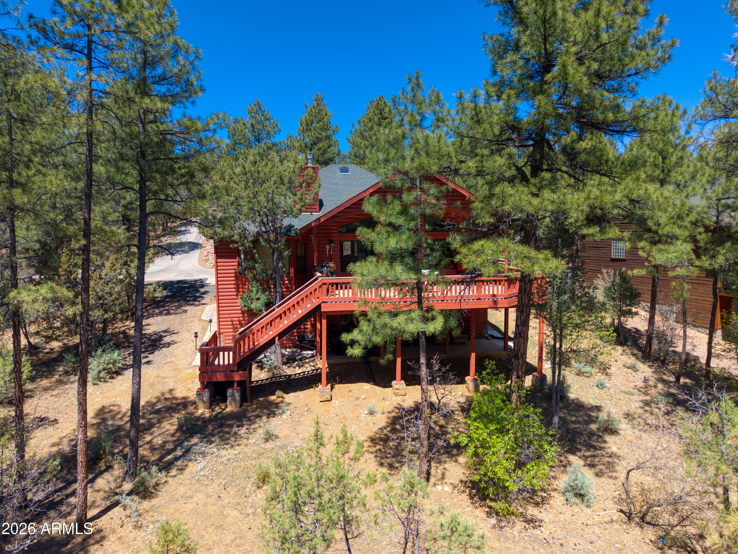 Rare Custom Home in Gated Pine Oaks - Private Cul-de-Sac Hideaway in the Tall Pines Discover this exceptional custom-built home in the highly sought-after gated community of Pine Oaks in Show Low. Tucked away on a quiet cul-de-sac and nestled among towering pines, this pristine retreat offers the perfect blend of privacy, luxury, and mountain living. Set on an oversized lot, the home features a massive rear deck ideal for outdoor entertaining, relaxing, or simply soaking in the peaceful forest surroundings. Inside, custom finishes and meticulous care shine throughout. The main level boasts a spacious, open common area perfect for family gatherings, holiday dinners, or cozy evenings around the fireplace. The walk-out basement is a standout -- offering a versatile gathering space for games, movie nights, or a kids' play area. It includes a 4th bedroom and 3rd full bathroom, making it ideal for multi-generational living, guests, a home office, or even a private rental space for additional income. Additional highlights include:
Close proximity to shopping, fishing, hiking and golf. There is plenty for everyone to do and see. The oversized garage has ample room for storage, a workbench or extra vehicle. The beautiful custom details and finishes are in impeccable condition. The thoughtful layout maximizes comfort and functionality.