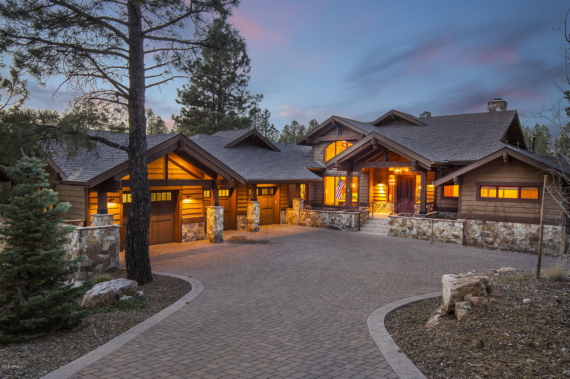 This custom home located on the 6th tee box and nestled in a quiet, private cul-de-sac, is perfect for families and entertaining. 5 bedrooms, all with ensuite bathrooms. The great room includes spectacular views of the golf course, a wood burning fire place, reclaimed white oak hardwood floors, and exposed reclaimed beams. The kitchen includes a large island, Thermador appliances, 2 sinks and 2 dishwashers. Wrap-around Trex deck. Restoration Hardware lighting throughout. Downstairs includes a second family room and 2 bedrooms, with one bedroom having an attached bunk room. A unique feature of this home is a separate bar that opens onto the patio overlooking the golf course. Watch your favorite sporting events on the two TVs, or enjoy a cocktail after a day on the course.