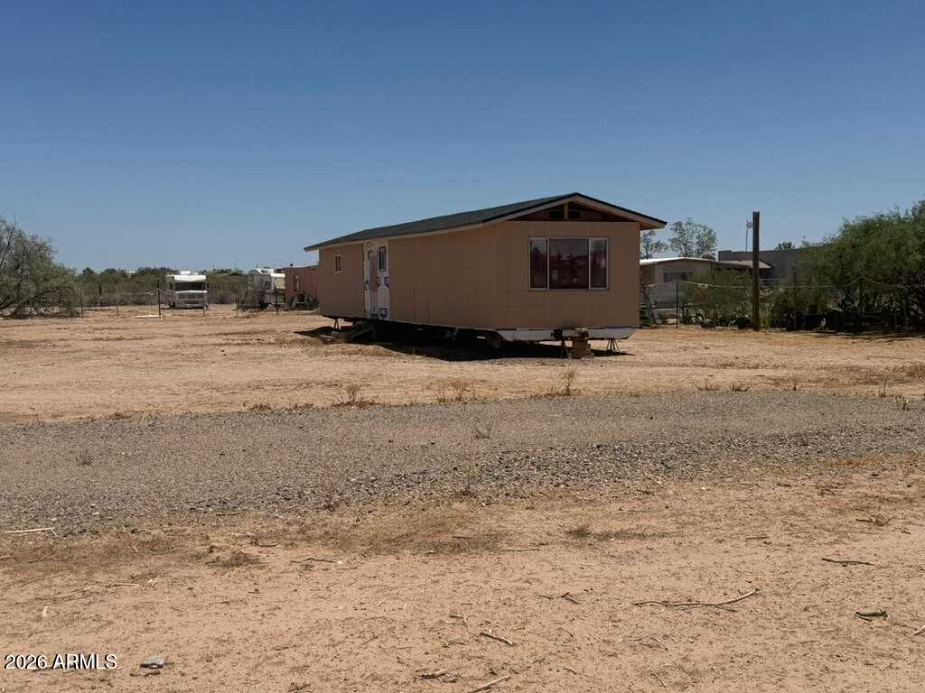 This 1-acre lot is the perfect location for your custom home. A shared well is already in place, and electricity is easily accessible. Conveniently located near the main road and surrounded by other established homes, this property offers stunning mountain and desert views, providing the ideal backdrop for your dream residence.